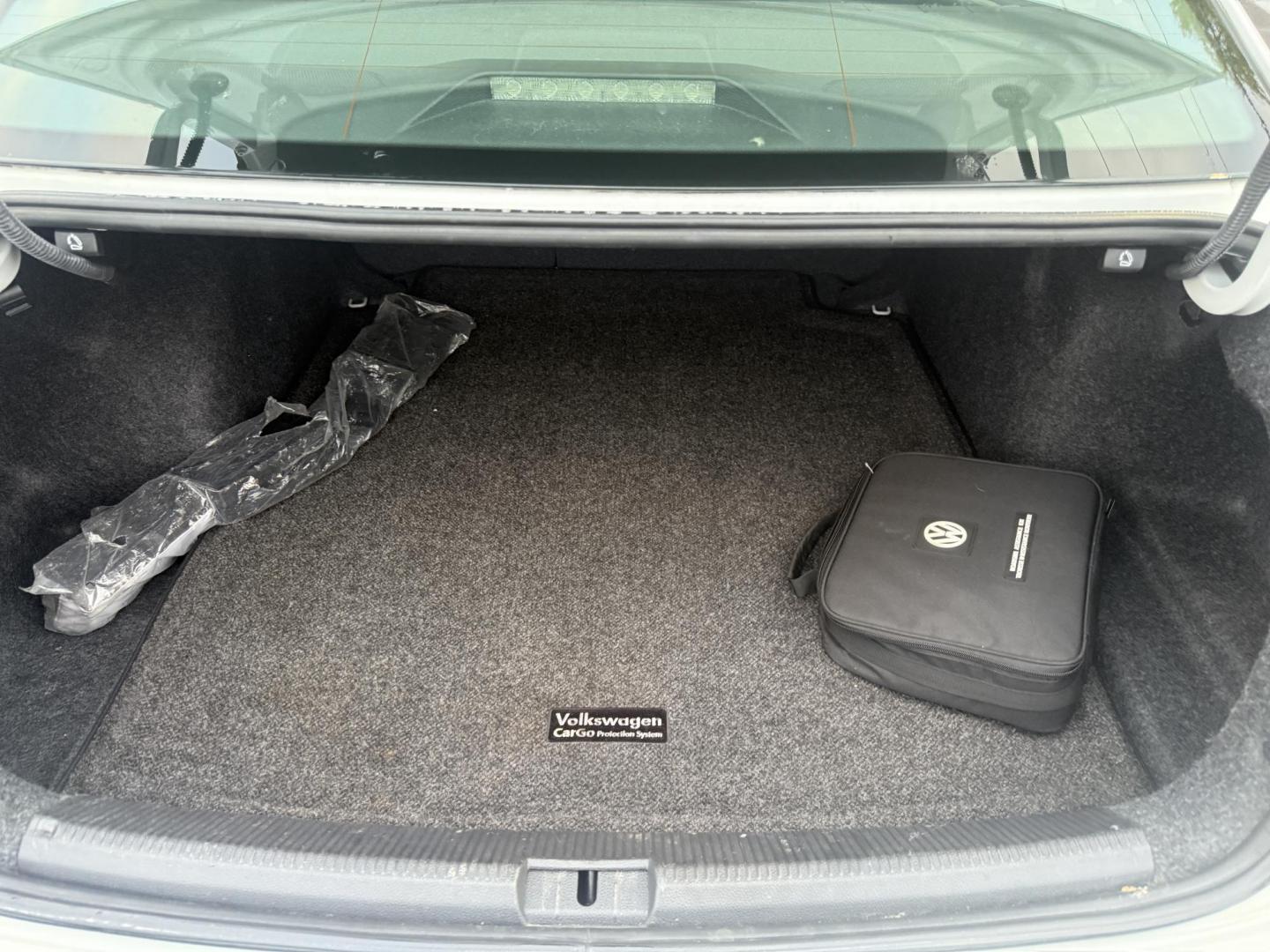 2018 White /Black Volkswagen Passat S (1VWAA7A3XJC) with an 2.0L I4 DOHC 16V Turbo engine, 6A transmission, located at 11115 Chardon Rd. , Chardon, OH, 44024, (440) 214-9705, 41.580246, -81.241943 - Experience comfort and efficiency in this 2018 Volkswagen Passat S. Equipped with a turbocharged 2.0L TSI engine and 6-speed automatic transmission, this sedan delivers a smooth ride and outstanding fuel economy—up to 36 MPG on the highway. Enjoy peace of mind with advanced safety features like bl - Photo#35