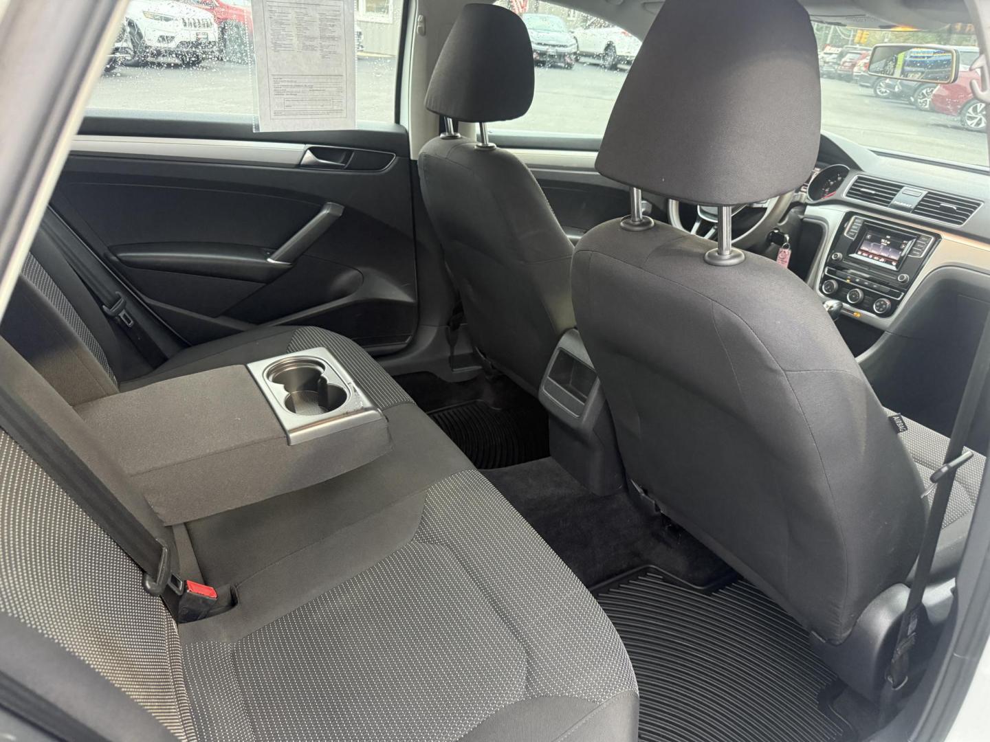 2018 White /Black Volkswagen Passat S (1VWAA7A3XJC) with an 2.0L I4 DOHC 16V Turbo engine, 6A transmission, located at 11115 Chardon Rd. , Chardon, OH, 44024, (440) 214-9705, 41.580246, -81.241943 - Experience comfort and efficiency in this 2018 Volkswagen Passat S. Equipped with a turbocharged 2.0L TSI engine and 6-speed automatic transmission, this sedan delivers a smooth ride and outstanding fuel economy—up to 36 MPG on the highway. Enjoy peace of mind with advanced safety features like bl - Photo#37