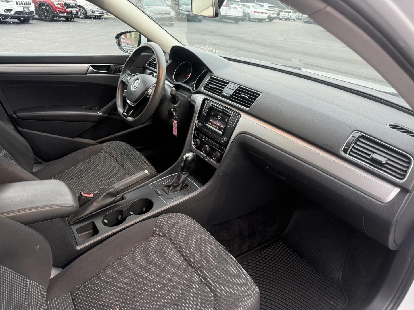 2018 White /Black Volkswagen Passat S (1VWAA7A3XJC) with an 2.0L I4 DOHC 16V Turbo engine, 6A transmission, located at 11115 Chardon Rd. , Chardon, OH, 44024, (440) 214-9705, 41.580246, -81.241943 - Experience comfort and efficiency in this 2018 Volkswagen Passat S. Equipped with a turbocharged 2.0L TSI engine and 6-speed automatic transmission, this sedan delivers a smooth ride and outstanding fuel economy—up to 36 MPG on the highway. Enjoy peace of mind with advanced safety features like bl - Photo#39