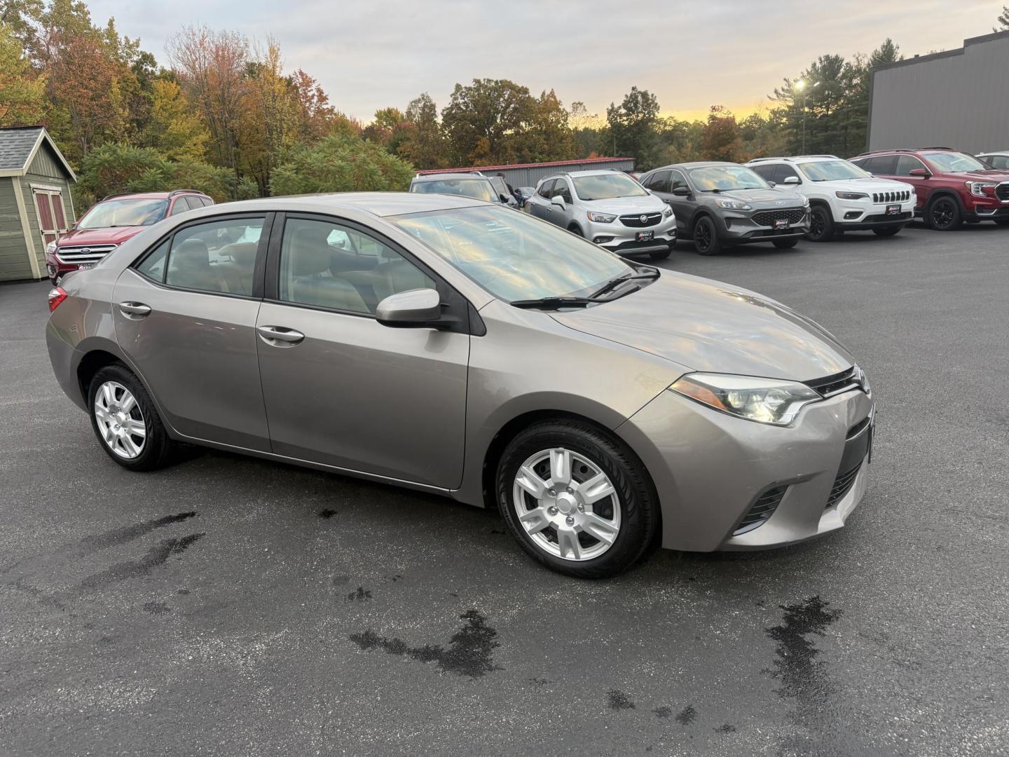 2016 Gray /Tan Toyota Corolla LE (2T1BURHE6GC) with an 1.8L I4 DOHC 16V engine, Automatic transmission, located at 11115 Chardon Rd. , Chardon, OH, 44024, (440) 214-9705, 41.580246, -81.241943 - Enjoy reliability, efficiency, and comfort in this 2016 Toyota Corolla LE. Powered by a fuel-efficient 1.8L I4 engine, this sedan delivers up to 37 MPG on the highway and features selectable ECO and Sport modes for a personalized driving experience. The well-appointed interior includes single zone a - Photo#3