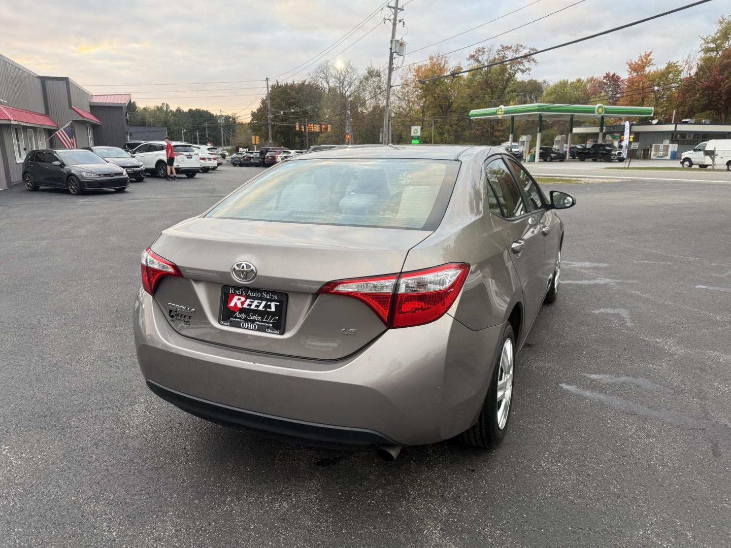 2016 Gray /Tan Toyota Corolla LE (2T1BURHE6GC) with an 1.8L I4 DOHC 16V engine, Automatic transmission, located at 11115 Chardon Rd. , Chardon, OH, 44024, (440) 214-9705, 41.580246, -81.241943 - Enjoy reliability, efficiency, and comfort in this 2016 Toyota Corolla LE. Powered by a fuel-efficient 1.8L I4 engine, this sedan delivers up to 37 MPG on the highway and features selectable ECO and Sport modes for a personalized driving experience. The well-appointed interior includes single zone a - Photo#7