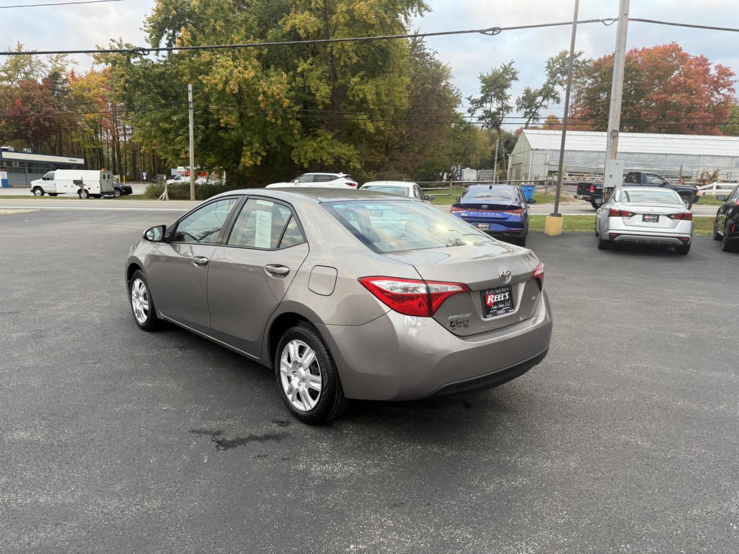 2016 Gray /Tan Toyota Corolla LE (2T1BURHE6GC) with an 1.8L I4 DOHC 16V engine, Automatic transmission, located at 11115 Chardon Rd. , Chardon, OH, 44024, (440) 214-9705, 41.580246, -81.241943 - Enjoy reliability, efficiency, and comfort in this 2016 Toyota Corolla LE. Powered by a fuel-efficient 1.8L I4 engine, this sedan delivers up to 37 MPG on the highway and features selectable ECO and Sport modes for a personalized driving experience. The well-appointed interior includes single zone a - Photo#9