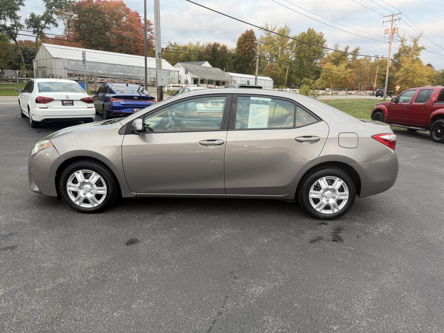 2016 Gray /Tan Toyota Corolla LE (2T1BURHE6GC) with an 1.8L I4 DOHC 16V engine, Automatic transmission, located at 11115 Chardon Rd. , Chardon, OH, 44024, (440) 214-9705, 41.580246, -81.241943 - Enjoy reliability, efficiency, and comfort in this 2016 Toyota Corolla LE. Powered by a fuel-efficient 1.8L I4 engine, this sedan delivers up to 37 MPG on the highway and features selectable ECO and Sport modes for a personalized driving experience. The well-appointed interior includes single zone a - Photo#12