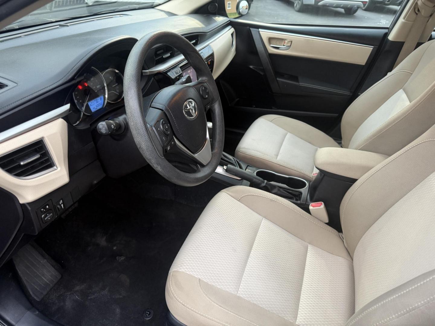 2016 Gray /Tan Toyota Corolla LE (2T1BURHE6GC) with an 1.8L I4 DOHC 16V engine, Automatic transmission, located at 11115 Chardon Rd. , Chardon, OH, 44024, (440) 214-9705, 41.580246, -81.241943 - Enjoy reliability, efficiency, and comfort in this 2016 Toyota Corolla LE. Powered by a fuel-efficient 1.8L I4 engine, this sedan delivers up to 37 MPG on the highway and features selectable ECO and Sport modes for a personalized driving experience. The well-appointed interior includes single zone a - Photo#14