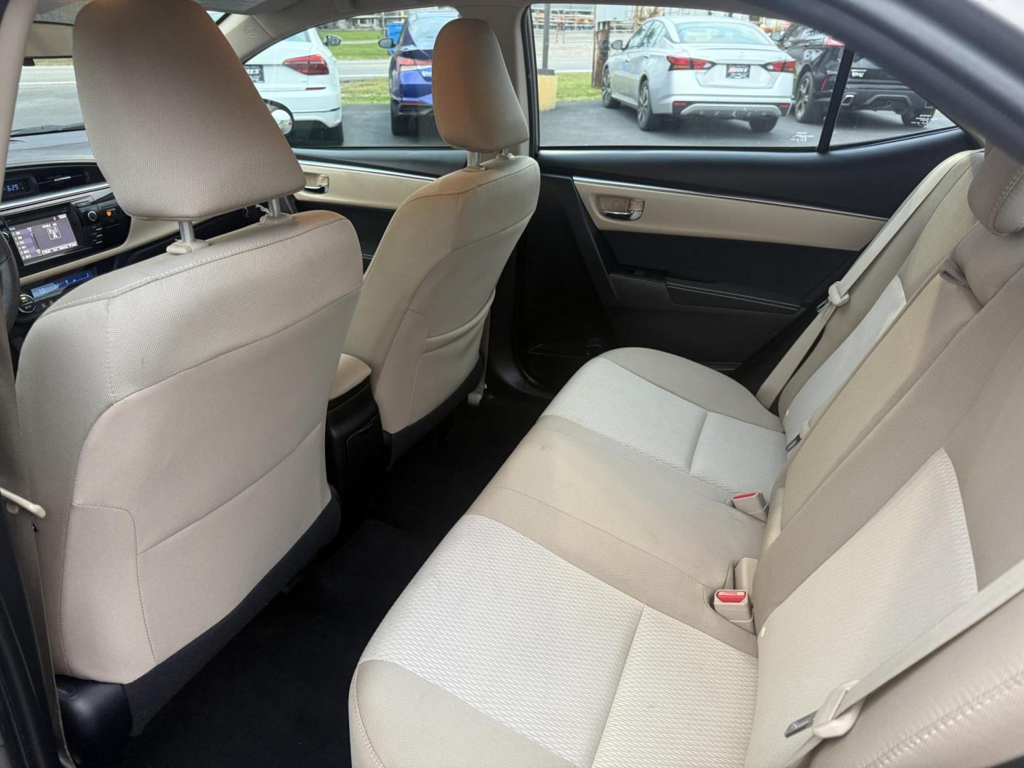 2016 Gray /Tan Toyota Corolla LE (2T1BURHE6GC) with an 1.8L I4 DOHC 16V engine, Automatic transmission, located at 11115 Chardon Rd. , Chardon, OH, 44024, (440) 214-9705, 41.580246, -81.241943 - Enjoy reliability, efficiency, and comfort in this 2016 Toyota Corolla LE. Powered by a fuel-efficient 1.8L I4 engine, this sedan delivers up to 37 MPG on the highway and features selectable ECO and Sport modes for a personalized driving experience. The well-appointed interior includes single zone a - Photo#26