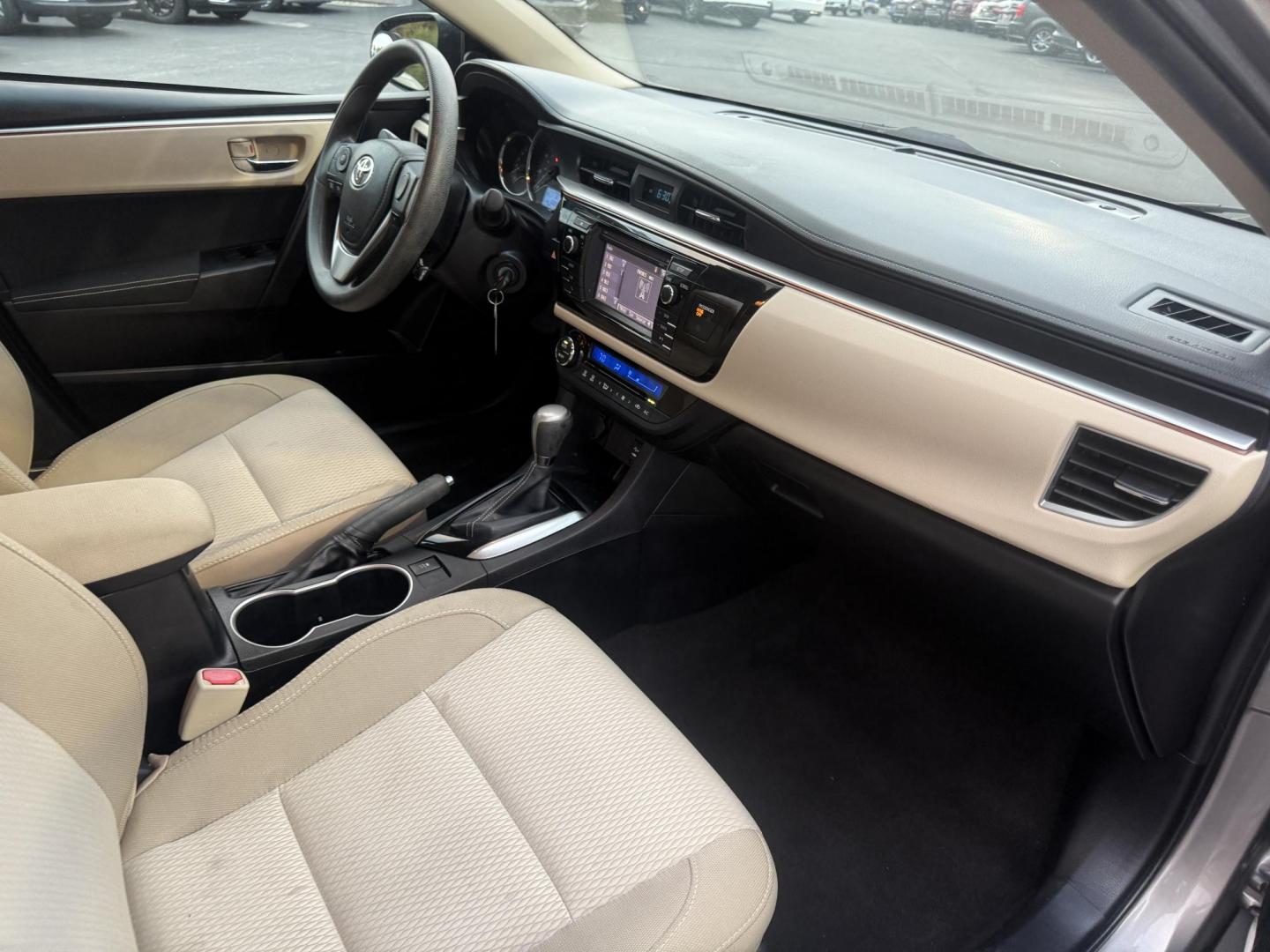 2016 Gray /Tan Toyota Corolla LE (2T1BURHE6GC) with an 1.8L I4 DOHC 16V engine, Automatic transmission, located at 11115 Chardon Rd. , Chardon, OH, 44024, (440) 214-9705, 41.580246, -81.241943 - Enjoy reliability, efficiency, and comfort in this 2016 Toyota Corolla LE. Powered by a fuel-efficient 1.8L I4 engine, this sedan delivers up to 37 MPG on the highway and features selectable ECO and Sport modes for a personalized driving experience. The well-appointed interior includes single zone a - Photo#33