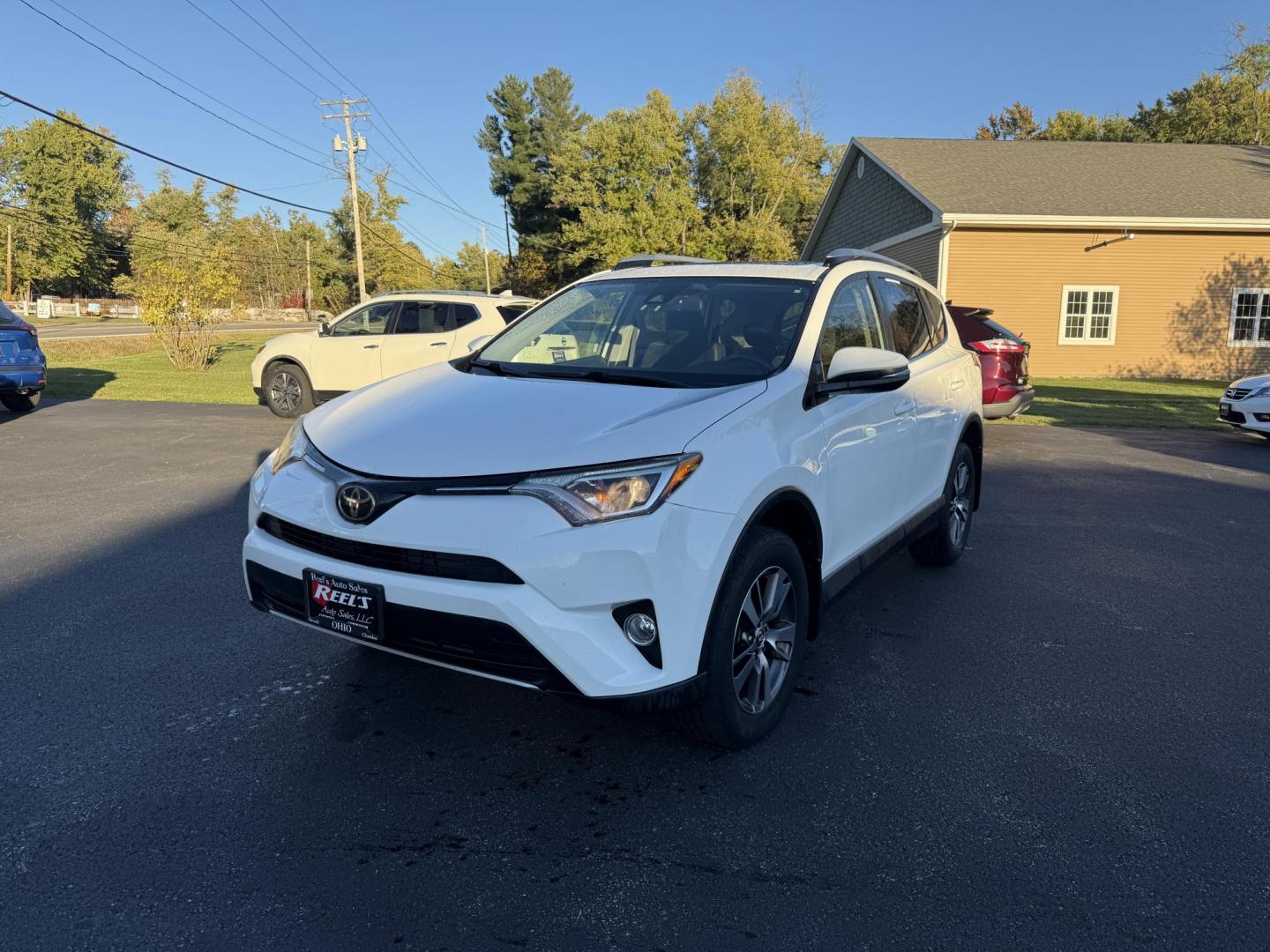 2017 White /Black Toyota RAV4 XLE AWD (JTMRFREV9HJ) with an 2.5LI4 DOHC 16V engine, 6A transmission, located at 11115 Chardon Rd. , Chardon, OH, 44024, (440) 214-9705, 41.580246, -81.241943 - 2017 Toyota RAV4 XLE AWD – Efficient, Smart, and Ready for Adventure Take on any journey with confidence in this 2017 Toyota RAV4 XLE AWD. Powered by a fuel-efficient 2.5L I4 engine and 6-speed automatic transmission, this SUV delivers 28 MPG on the highway, while Sport and ECO modes let you ta - Photo#0