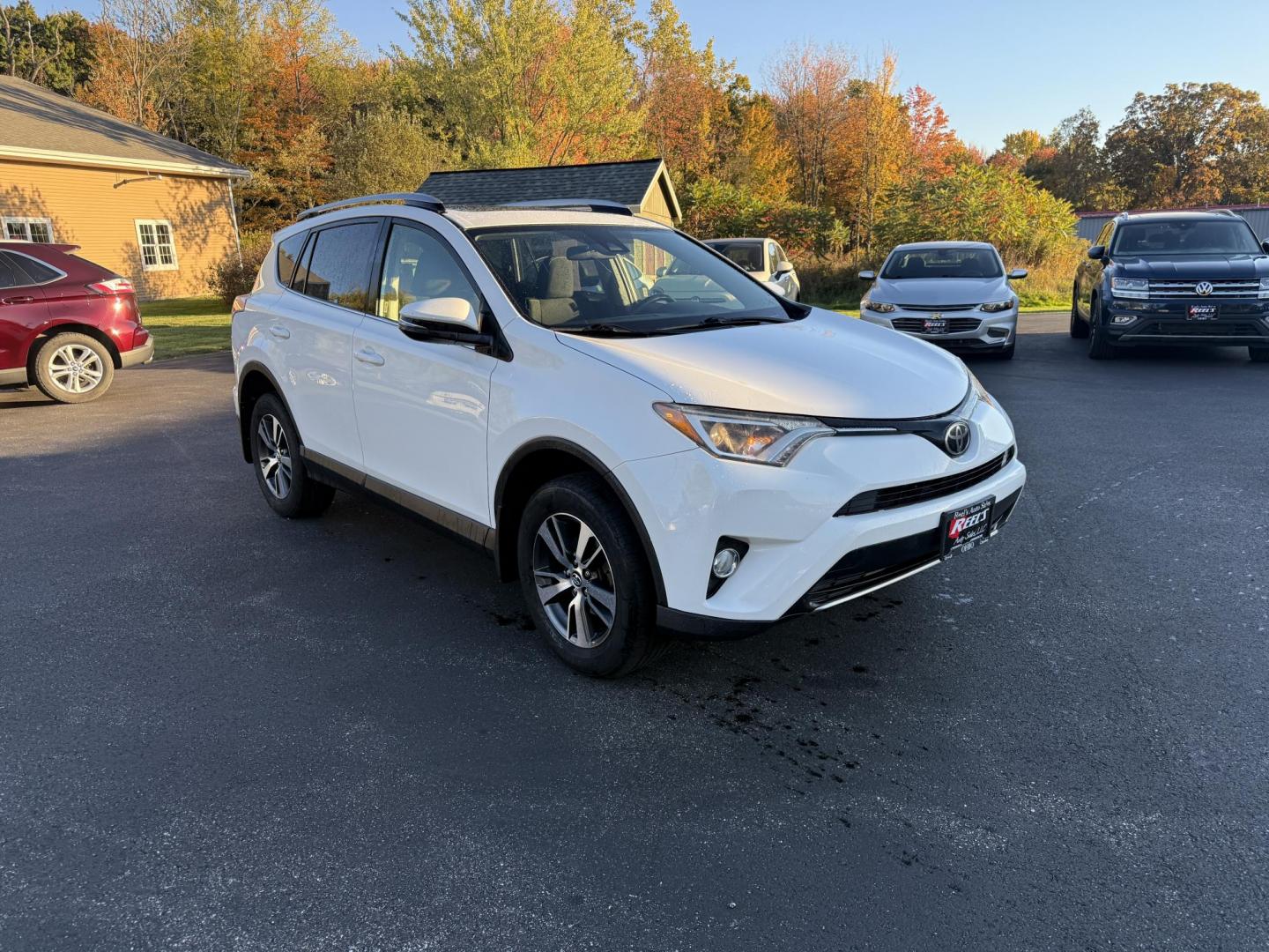 2017 White /Black Toyota RAV4 XLE AWD (JTMRFREV9HJ) with an 2.5LI4 DOHC 16V engine, 6A transmission, located at 11115 Chardon Rd. , Chardon, OH, 44024, (440) 214-9705, 41.580246, -81.241943 - 2017 Toyota RAV4 XLE AWD – Efficient, Smart, and Ready for Adventure Take on any journey with confidence in this 2017 Toyota RAV4 XLE AWD. Powered by a fuel-efficient 2.5L I4 engine and 6-speed automatic transmission, this SUV delivers 28 MPG on the highway, while Sport and ECO modes let you ta - Photo#2