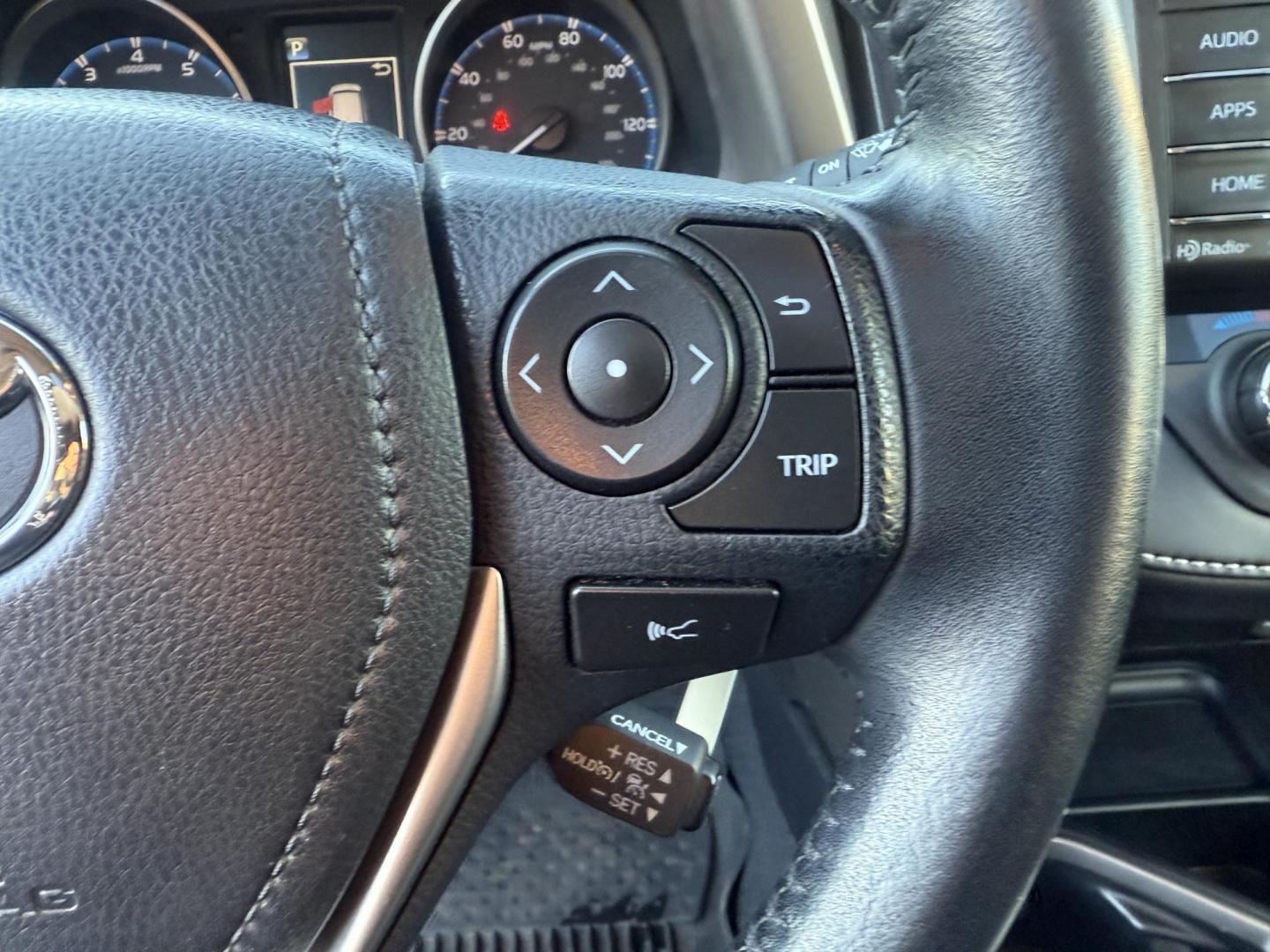 2017 White /Black Toyota RAV4 XLE AWD (JTMRFREV9HJ) with an 2.5LI4 DOHC 16V engine, 6A transmission, located at 11115 Chardon Rd. , Chardon, OH, 44024, (440) 214-9705, 41.580246, -81.241943 - 2017 Toyota RAV4 XLE AWD – Efficient, Smart, and Ready for Adventure Take on any journey with confidence in this 2017 Toyota RAV4 XLE AWD. Powered by a fuel-efficient 2.5L I4 engine and 6-speed automatic transmission, this SUV delivers 28 MPG on the highway, while Sport and ECO modes let you ta - Photo#24