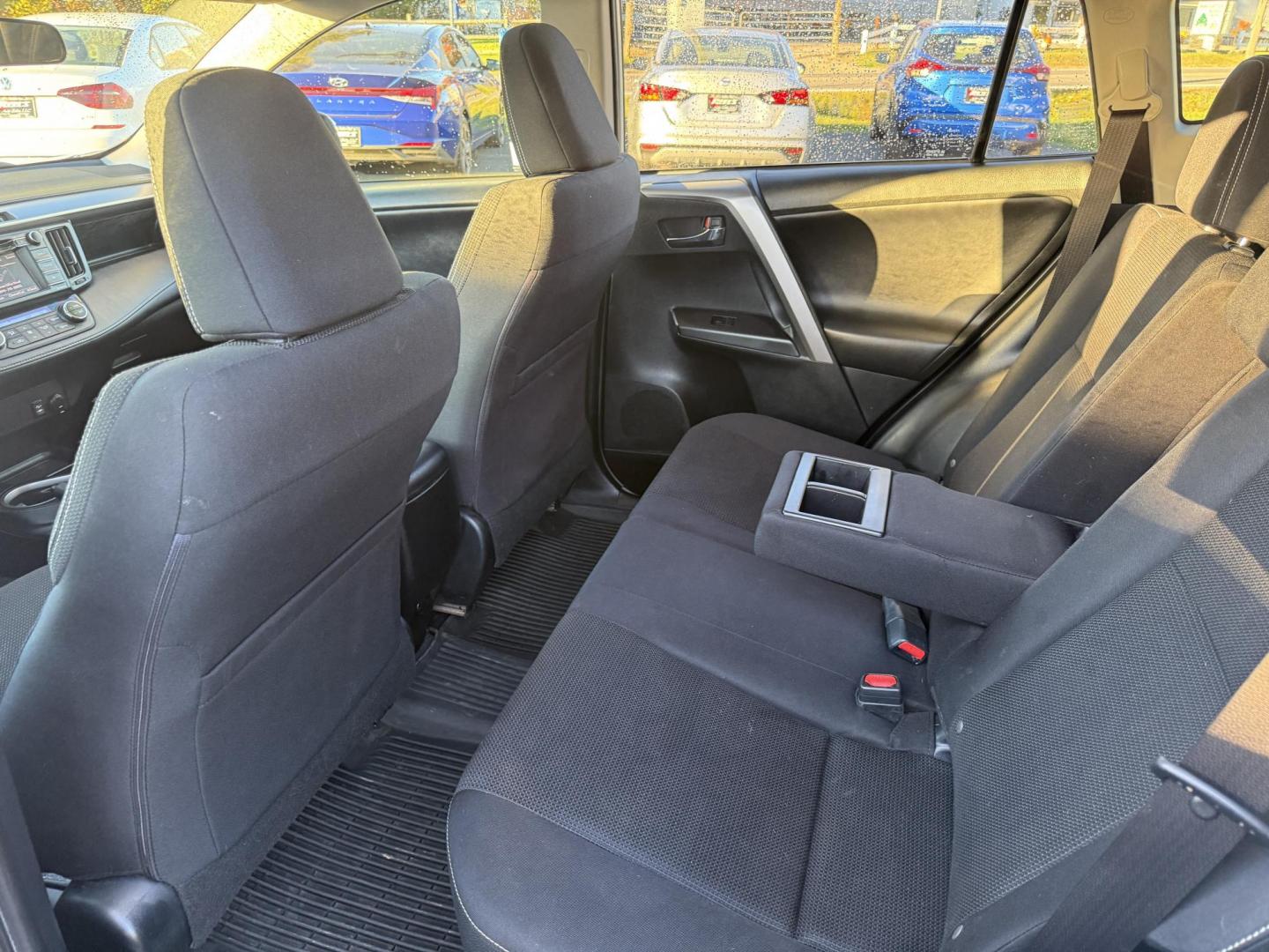 2017 White /Black Toyota RAV4 XLE AWD (JTMRFREV9HJ) with an 2.5LI4 DOHC 16V engine, 6A transmission, located at 11115 Chardon Rd. , Chardon, OH, 44024, (440) 214-9705, 41.580246, -81.241943 - 2017 Toyota RAV4 XLE AWD – Efficient, Smart, and Ready for Adventure Take on any journey with confidence in this 2017 Toyota RAV4 XLE AWD. Powered by a fuel-efficient 2.5L I4 engine and 6-speed automatic transmission, this SUV delivers 28 MPG on the highway, while Sport and ECO modes let you ta - Photo#34