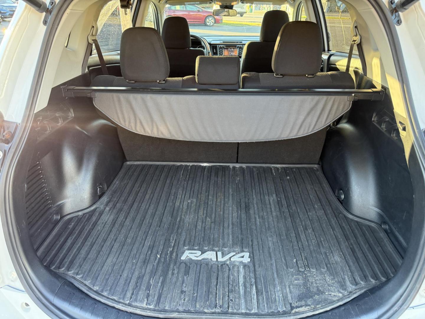 2017 White /Black Toyota RAV4 XLE AWD (JTMRFREV9HJ) with an 2.5LI4 DOHC 16V engine, 6A transmission, located at 11115 Chardon Rd. , Chardon, OH, 44024, (440) 214-9705, 41.580246, -81.241943 - 2017 Toyota RAV4 XLE AWD – Efficient, Smart, and Ready for Adventure Take on any journey with confidence in this 2017 Toyota RAV4 XLE AWD. Powered by a fuel-efficient 2.5L I4 engine and 6-speed automatic transmission, this SUV delivers 28 MPG on the highway, while Sport and ECO modes let you ta - Photo#38