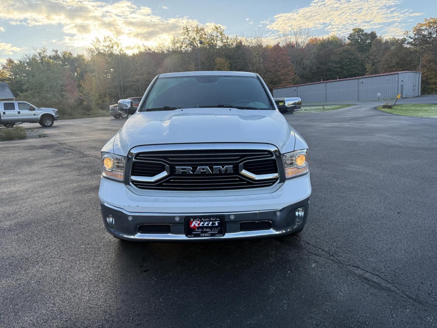 2017 White /Black RAM 1500 Limited Crew Cab SWB 4WD (1C6RR7PT4HS) with an 5.7L V8 OHV 16V engine, 8A transmission, located at 11115 Chardon Rd. , Chardon, OH, 44024, (440) 214-9705, 41.580246, -81.241943 - 2017 Ram 1500 Crew Cab Limited 4WD – Luxury and Power Combined Experience top-tier performance and comfort in this 2017 Ram 1500 Crew Cab Limited 4WD. Powered by a legendary 5.7L HEMI V8 engine with 395 HP and 410 lb-ft of torque, this truck offers an 8-speed automatic transmission, on-demand 4 - Photo#1