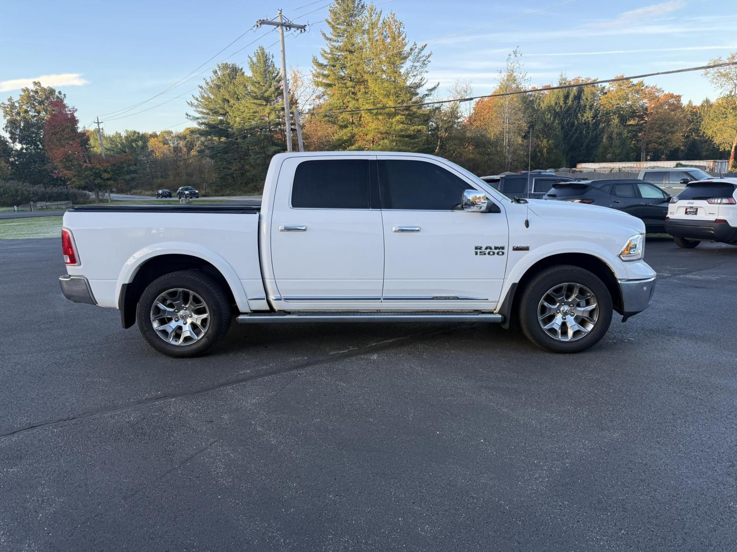 2017 White /Black RAM 1500 Limited Crew Cab SWB 4WD (1C6RR7PT4HS) with an 5.7L V8 OHV 16V engine, 8A transmission, located at 11115 Chardon Rd. , Chardon, OH, 44024, (440) 214-9705, 41.580246, -81.241943 - 2017 Ram 1500 Crew Cab Limited 4WD – Luxury and Power Combined Experience top-tier performance and comfort in this 2017 Ram 1500 Crew Cab Limited 4WD. Powered by a legendary 5.7L HEMI V8 engine with 395 HP and 410 lb-ft of torque, this truck offers an 8-speed automatic transmission, on-demand 4 - Photo#7