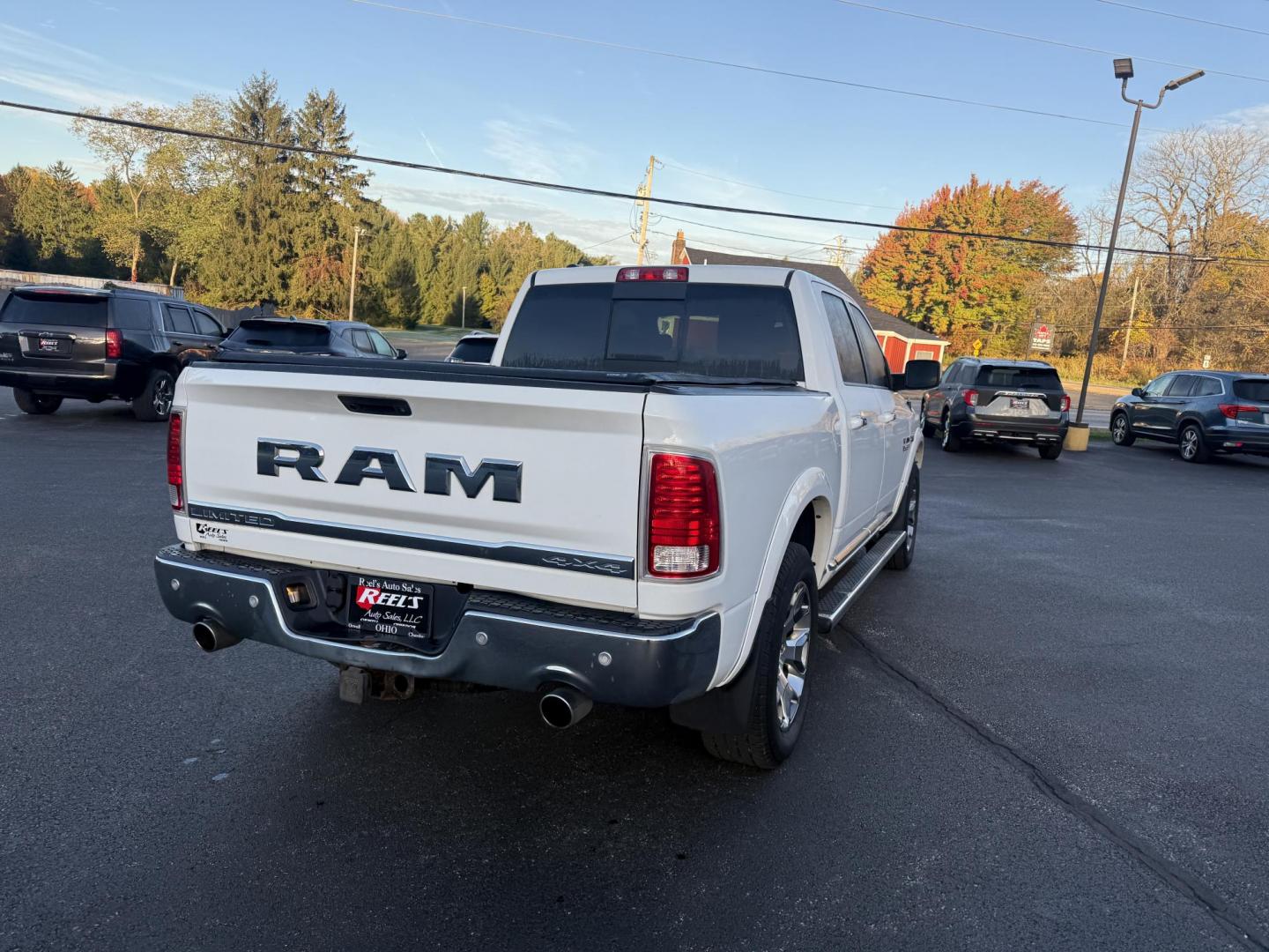 2017 White /Black RAM 1500 Limited Crew Cab SWB 4WD (1C6RR7PT4HS) with an 5.7L V8 OHV 16V engine, 8A transmission, located at 11115 Chardon Rd. , Chardon, OH, 44024, (440) 214-9705, 41.580246, -81.241943 - 2017 Ram 1500 Crew Cab Limited 4WD – Luxury and Power Combined Experience top-tier performance and comfort in this 2017 Ram 1500 Crew Cab Limited 4WD. Powered by a legendary 5.7L HEMI V8 engine with 395 HP and 410 lb-ft of torque, this truck offers an 8-speed automatic transmission, on-demand 4 - Photo#9