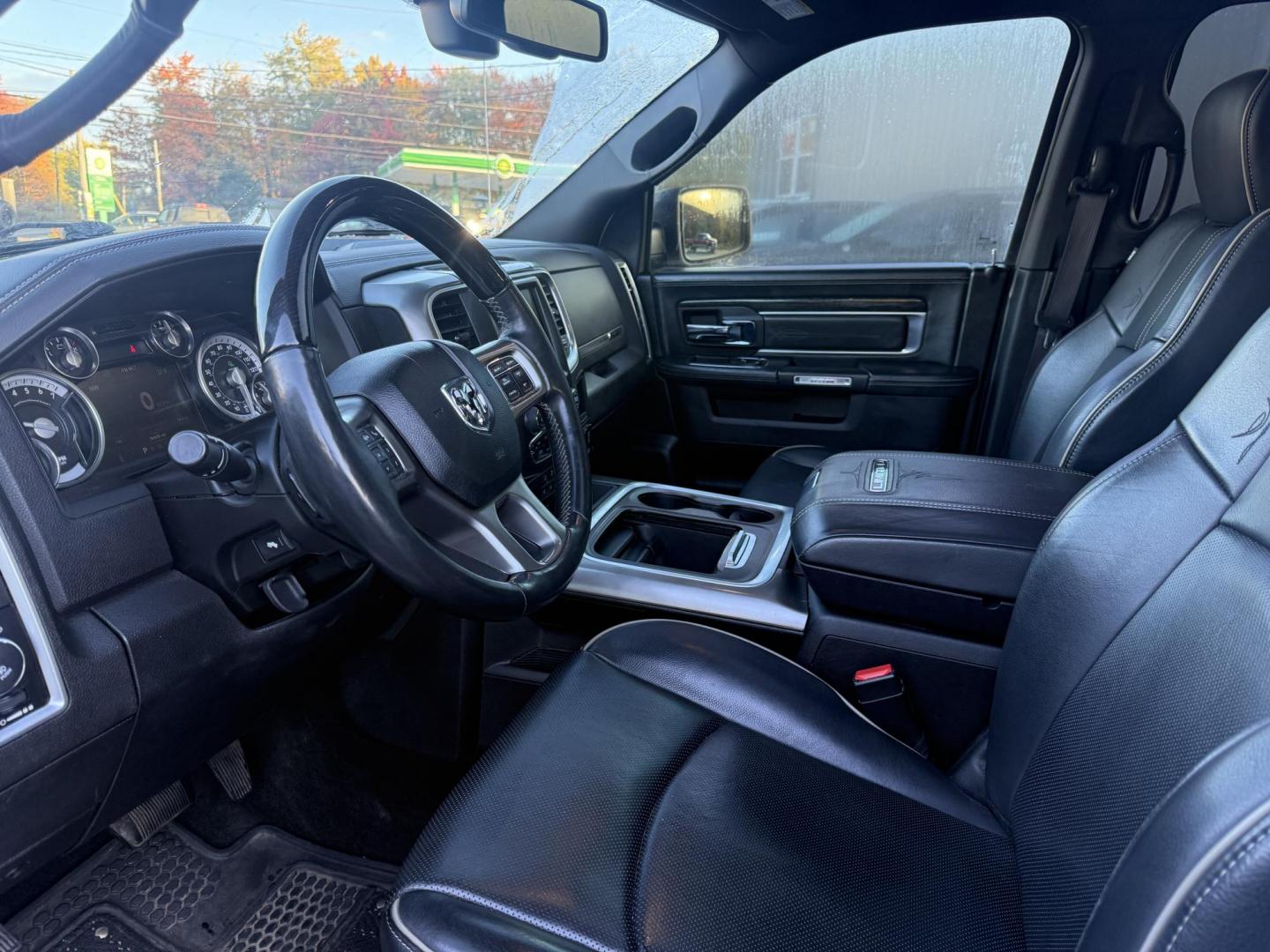 2017 White /Black RAM 1500 Limited Crew Cab SWB 4WD (1C6RR7PT4HS) with an 5.7L V8 OHV 16V engine, 8A transmission, located at 11115 Chardon Rd. , Chardon, OH, 44024, (440) 214-9705, 41.580246, -81.241943 - 2017 Ram 1500 Crew Cab Limited 4WD – Luxury and Power Combined Experience top-tier performance and comfort in this 2017 Ram 1500 Crew Cab Limited 4WD. Powered by a legendary 5.7L HEMI V8 engine with 395 HP and 410 lb-ft of torque, this truck offers an 8-speed automatic transmission, on-demand 4 - Photo#19
