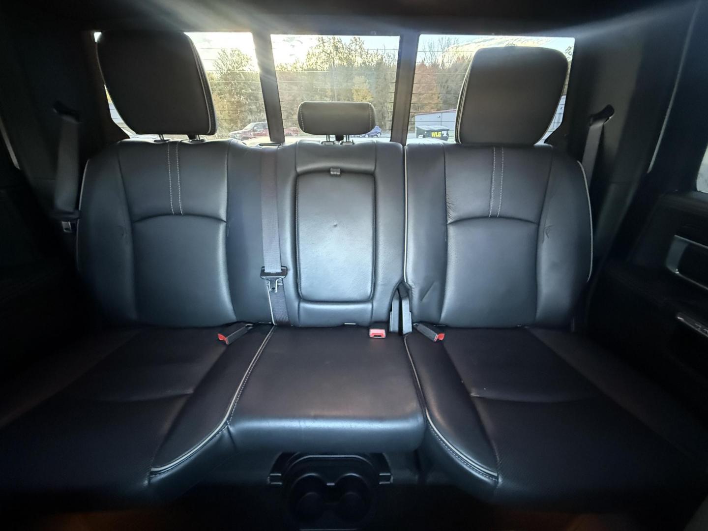 2017 White /Black RAM 1500 Limited Crew Cab SWB 4WD (1C6RR7PT4HS) with an 5.7L V8 OHV 16V engine, 8A transmission, located at 11115 Chardon Rd. , Chardon, OH, 44024, (440) 214-9705, 41.580246, -81.241943 - 2017 Ram 1500 Crew Cab Limited 4WD – Luxury and Power Combined Experience top-tier performance and comfort in this 2017 Ram 1500 Crew Cab Limited 4WD. Powered by a legendary 5.7L HEMI V8 engine with 395 HP and 410 lb-ft of torque, this truck offers an 8-speed automatic transmission, on-demand 4 - Photo#42