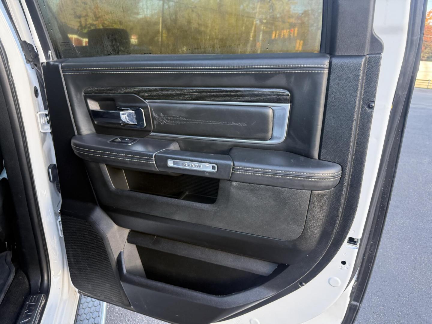 2017 White /Black RAM 1500 Limited Crew Cab SWB 4WD (1C6RR7PT4HS) with an 5.7L V8 OHV 16V engine, 8A transmission, located at 11115 Chardon Rd. , Chardon, OH, 44024, (440) 214-9705, 41.580246, -81.241943 - 2017 Ram 1500 Crew Cab Limited 4WD – Luxury and Power Combined Experience top-tier performance and comfort in this 2017 Ram 1500 Crew Cab Limited 4WD. Powered by a legendary 5.7L HEMI V8 engine with 395 HP and 410 lb-ft of torque, this truck offers an 8-speed automatic transmission, on-demand 4 - Photo#49