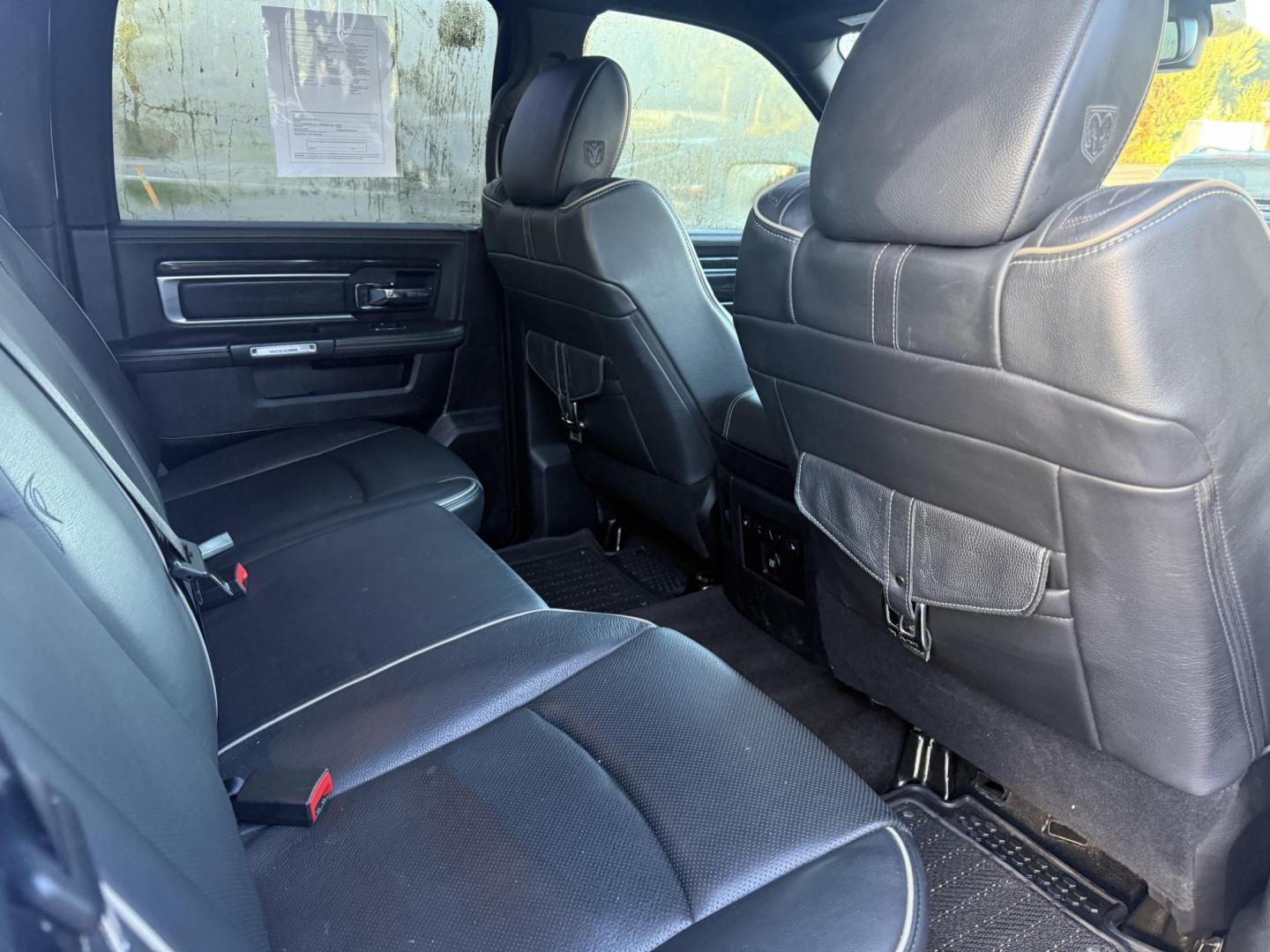 2017 White /Black RAM 1500 Limited Crew Cab SWB 4WD (1C6RR7PT4HS) with an 5.7L V8 OHV 16V engine, 8A transmission, located at 11115 Chardon Rd. , Chardon, OH, 44024, (440) 214-9705, 41.580246, -81.241943 - 2017 Ram 1500 Crew Cab Limited 4WD – Luxury and Power Combined Experience top-tier performance and comfort in this 2017 Ram 1500 Crew Cab Limited 4WD. Powered by a legendary 5.7L HEMI V8 engine with 395 HP and 410 lb-ft of torque, this truck offers an 8-speed automatic transmission, on-demand 4 - Photo#48