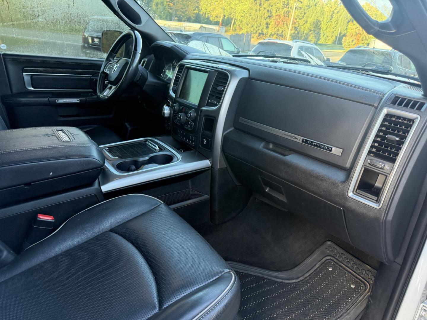 2017 White /Black RAM 1500 Limited Crew Cab SWB 4WD (1C6RR7PT4HS) with an 5.7L V8 OHV 16V engine, 8A transmission, located at 11115 Chardon Rd. , Chardon, OH, 44024, (440) 214-9705, 41.580246, -81.241943 - 2017 Ram 1500 Crew Cab Limited 4WD – Luxury and Power Combined Experience top-tier performance and comfort in this 2017 Ram 1500 Crew Cab Limited 4WD. Powered by a legendary 5.7L HEMI V8 engine with 395 HP and 410 lb-ft of torque, this truck offers an 8-speed automatic transmission, on-demand 4 - Photo#50