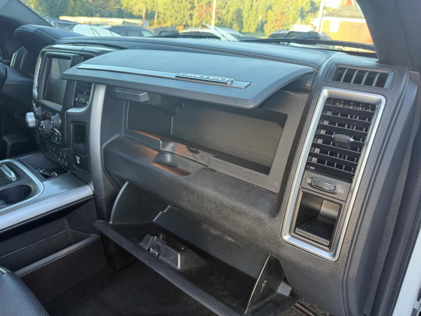 2017 White /Black RAM 1500 Limited Crew Cab SWB 4WD (1C6RR7PT4HS) with an 5.7L V8 OHV 16V engine, 8A transmission, located at 11115 Chardon Rd. , Chardon, OH, 44024, (440) 214-9705, 41.580246, -81.241943 - 2017 Ram 1500 Crew Cab Limited 4WD – Luxury and Power Combined Experience top-tier performance and comfort in this 2017 Ram 1500 Crew Cab Limited 4WD. Powered by a legendary 5.7L HEMI V8 engine with 395 HP and 410 lb-ft of torque, this truck offers an 8-speed automatic transmission, on-demand 4 - Photo#52