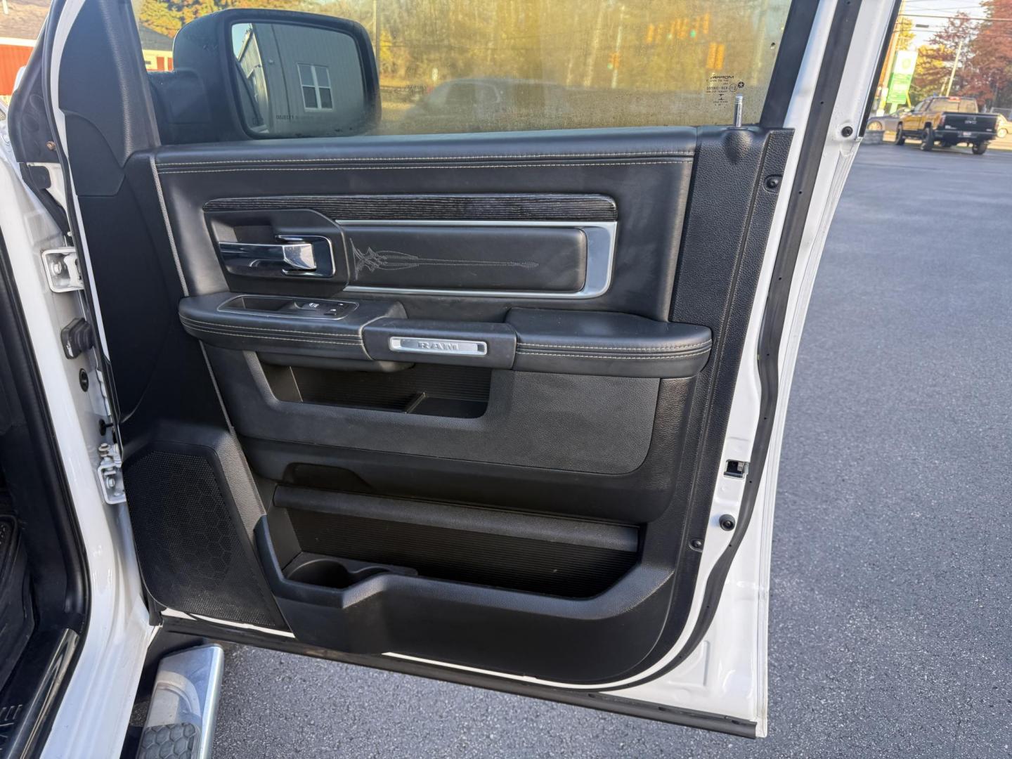 2017 White /Black RAM 1500 Limited Crew Cab SWB 4WD (1C6RR7PT4HS) with an 5.7L V8 OHV 16V engine, 8A transmission, located at 11115 Chardon Rd. , Chardon, OH, 44024, (440) 214-9705, 41.580246, -81.241943 - 2017 Ram 1500 Crew Cab Limited 4WD – Luxury and Power Combined Experience top-tier performance and comfort in this 2017 Ram 1500 Crew Cab Limited 4WD. Powered by a legendary 5.7L HEMI V8 engine with 395 HP and 410 lb-ft of torque, this truck offers an 8-speed automatic transmission, on-demand 4 - Photo#55