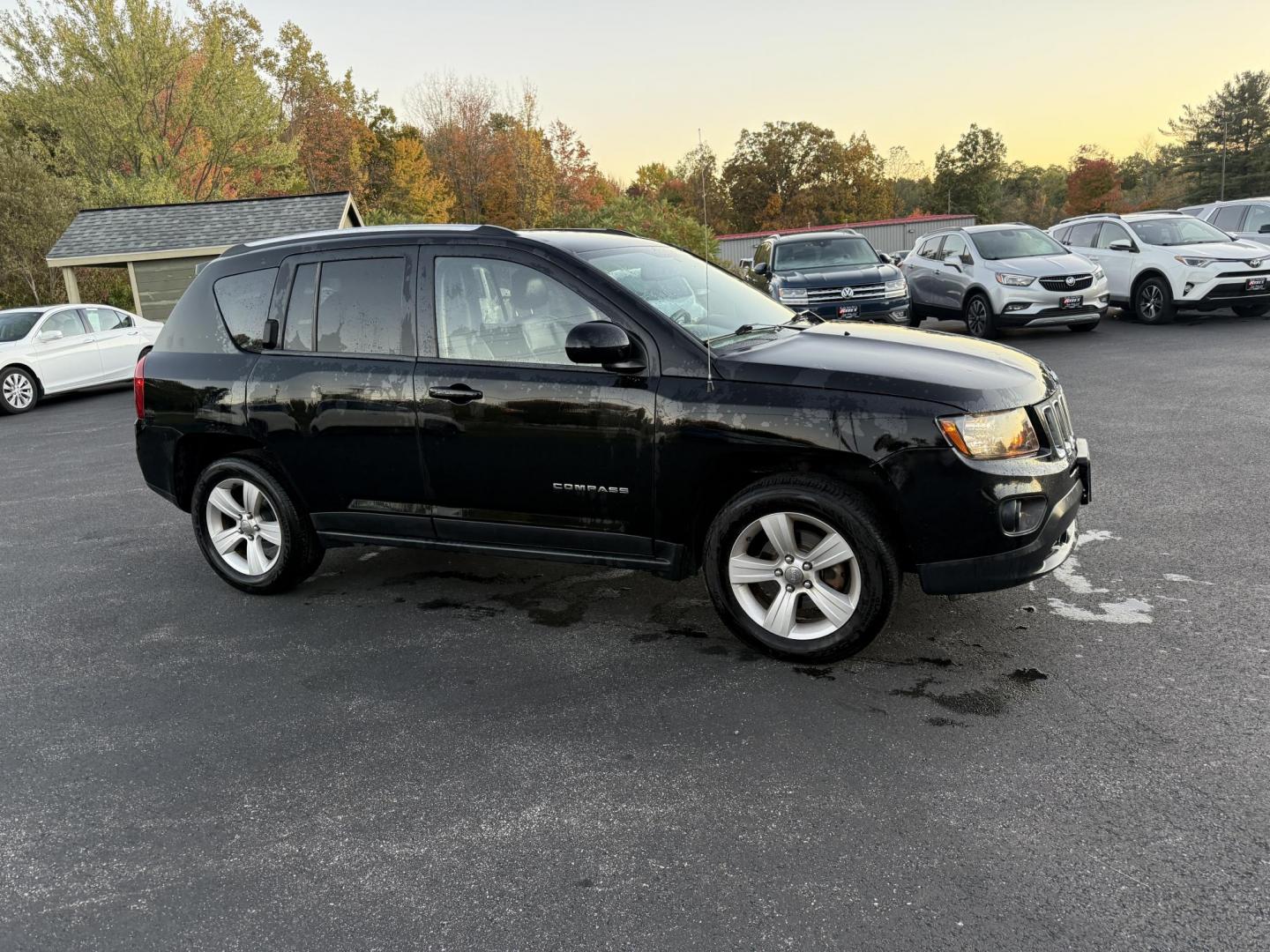 2015 Black /Black Jeep Compass Latitude 4WD (1C4NJDEB4FD) with an 2.4L I4 DOHC 16V engine, 6-Speed Automatic transmission, located at 11115 Chardon Rd. , Chardon, OH, 44024, (440) 214-9705, 41.580246, -81.241943 - Photo#3