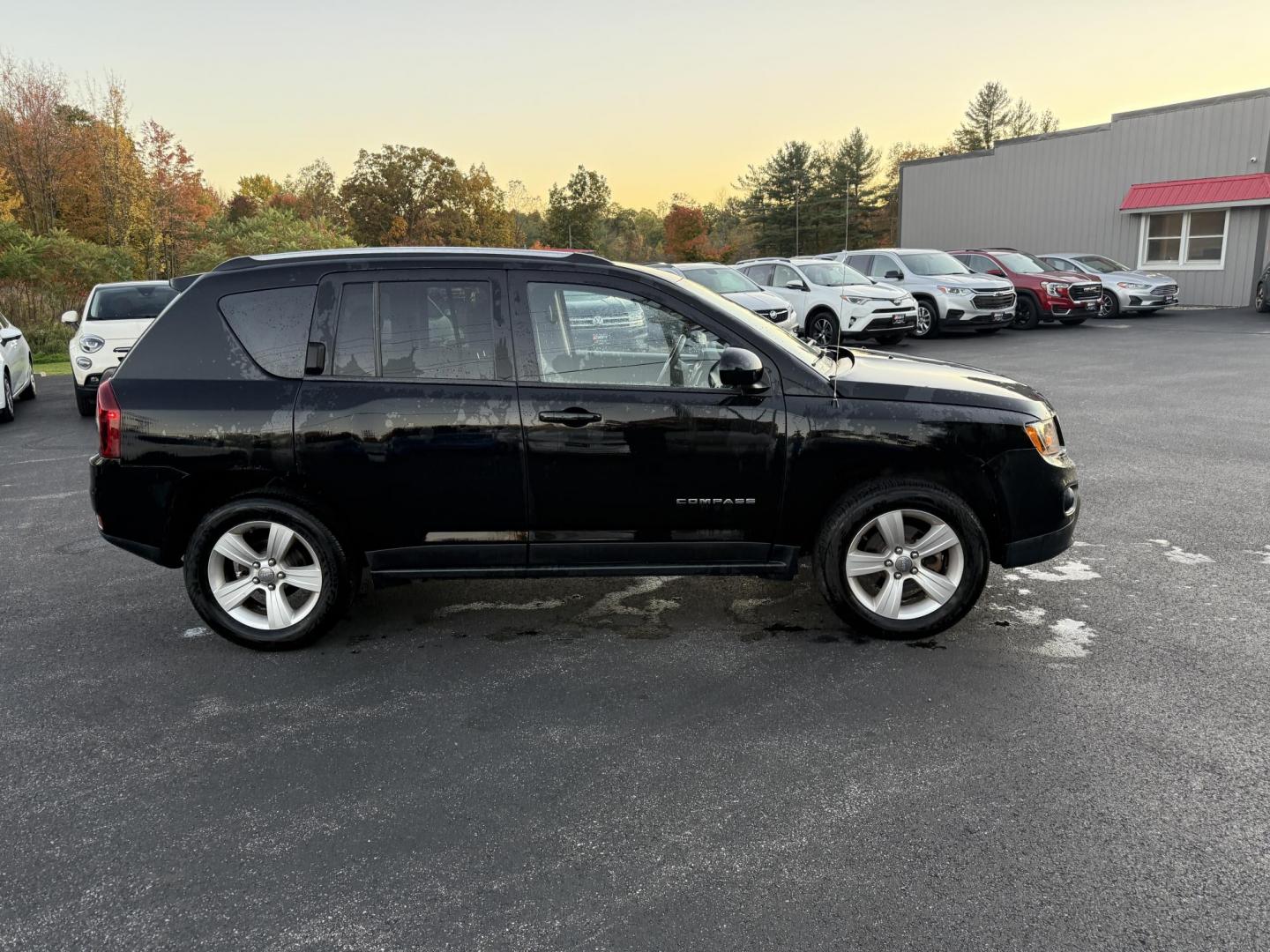 2015 Black /Black Jeep Compass Latitude 4WD (1C4NJDEB4FD) with an 2.4L I4 DOHC 16V engine, 6-Speed Automatic transmission, located at 11115 Chardon Rd. , Chardon, OH, 44024, (440) 214-9705, 41.580246, -81.241943 - Photo#5