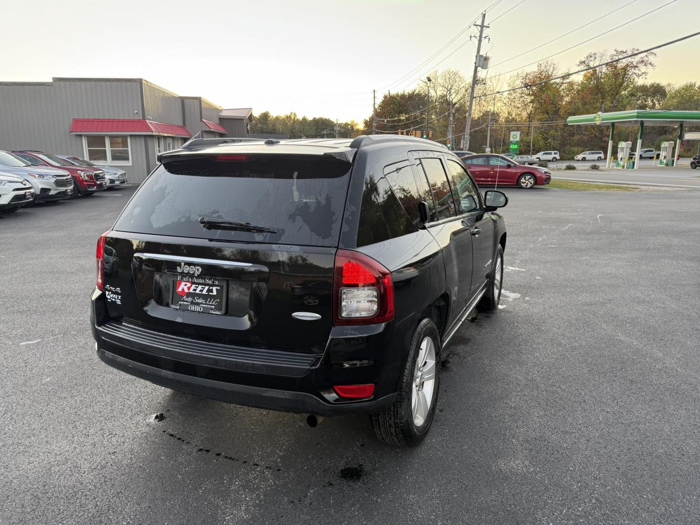 2015 Black /Black Jeep Compass Latitude 4WD (1C4NJDEB4FD) with an 2.4L I4 DOHC 16V engine, 6-Speed Automatic transmission, located at 11115 Chardon Rd. , Chardon, OH, 44024, (440) 214-9705, 41.580246, -81.241943 - Photo#7
