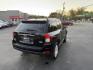 2015 Black /Black Jeep Compass Latitude 4WD (1C4NJDEB4FD) with an 2.4L I4 DOHC 16V engine, 6-Speed Automatic transmission, located at 11115 Chardon Rd. , Chardon, OH, 44024, (440) 214-9705, 41.580246, -81.241943 - Photo#7