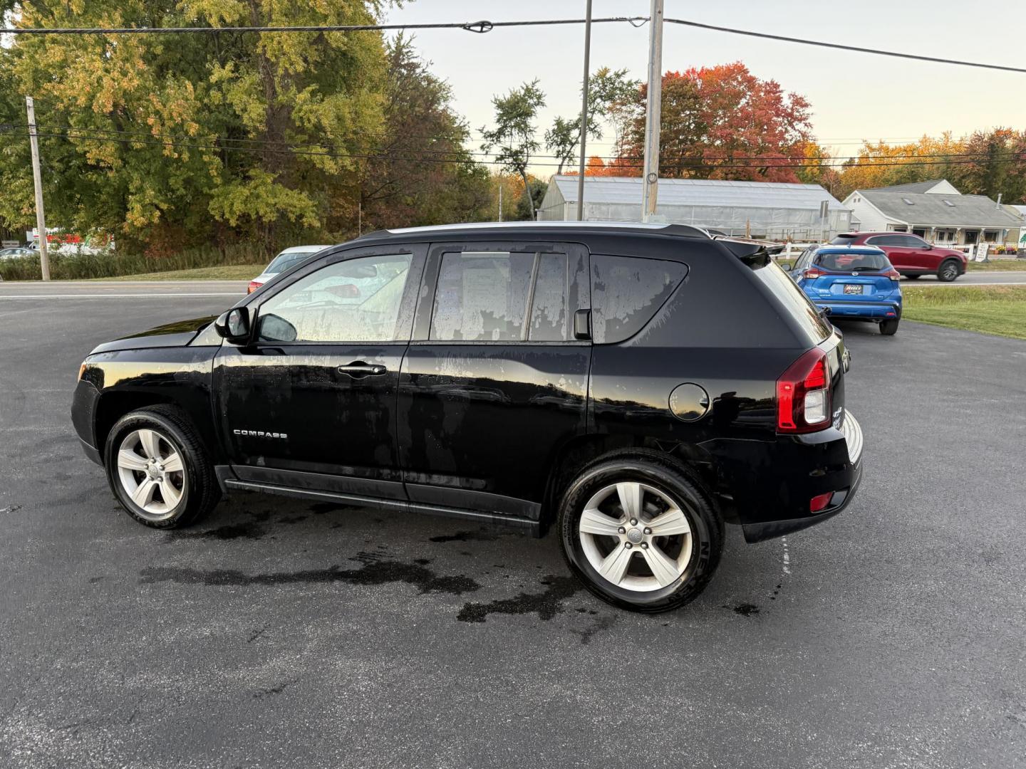 2015 Black /Black Jeep Compass Latitude 4WD (1C4NJDEB4FD) with an 2.4L I4 DOHC 16V engine, 6-Speed Automatic transmission, located at 11115 Chardon Rd. , Chardon, OH, 44024, (440) 214-9705, 41.580246, -81.241943 - Photo#10