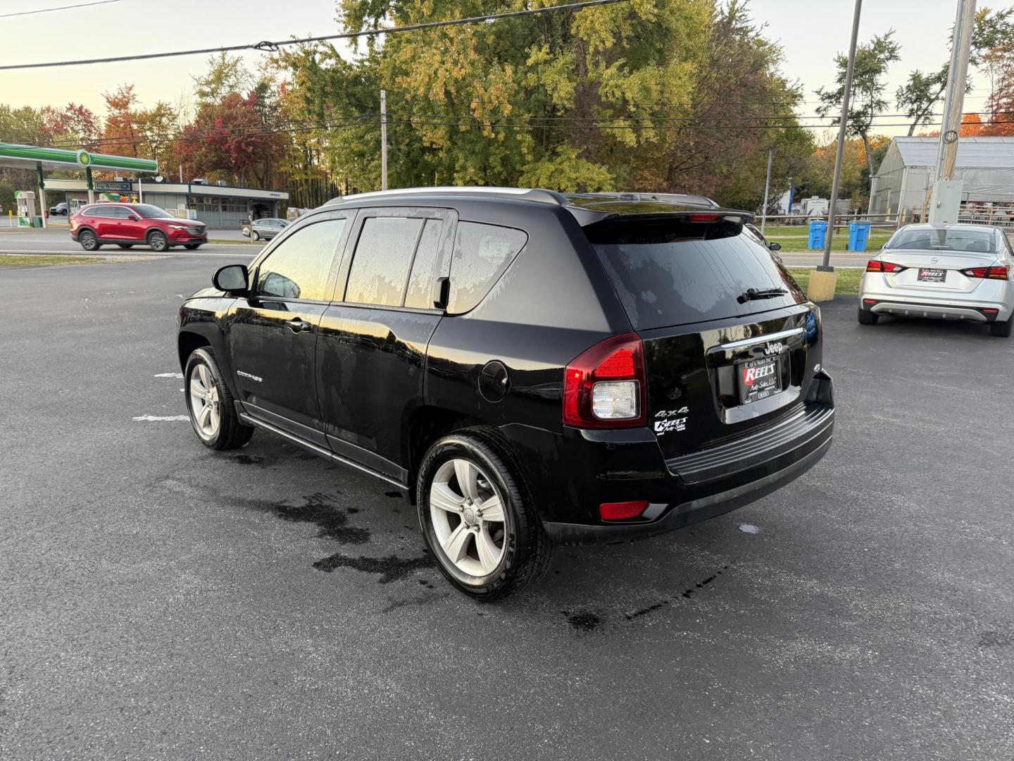 2015 Black /Black Jeep Compass Latitude 4WD (1C4NJDEB4FD) with an 2.4L I4 DOHC 16V engine, 6-Speed Automatic transmission, located at 11115 Chardon Rd. , Chardon, OH, 44024, (440) 214-9705, 41.580246, -81.241943 - Photo#9