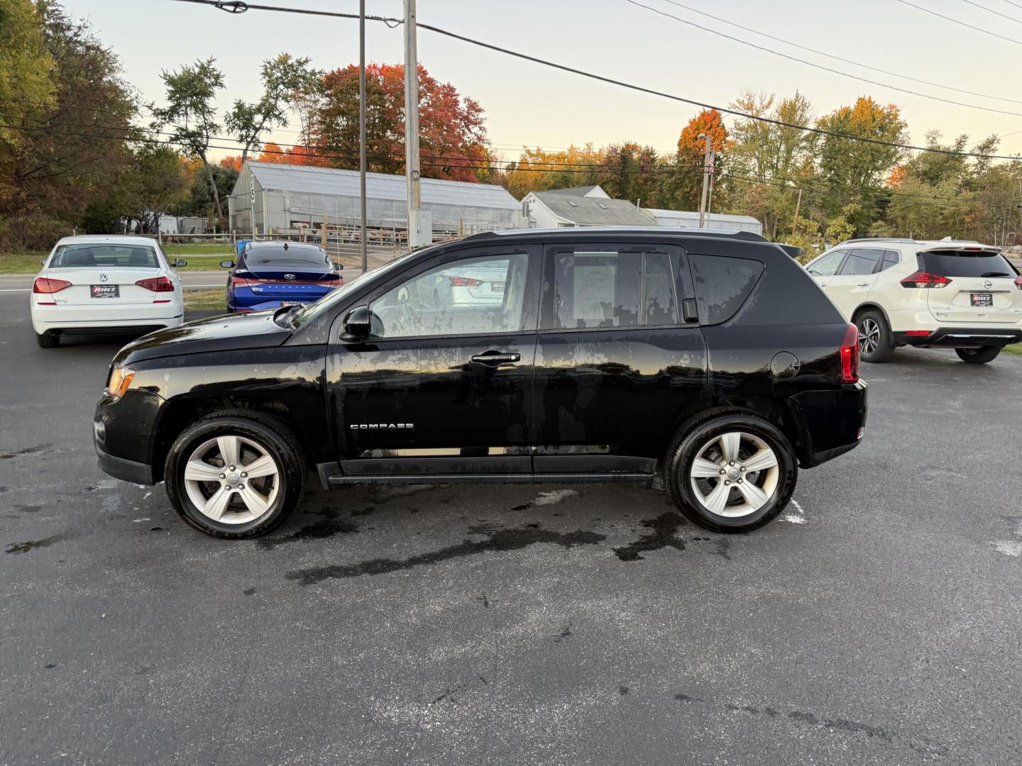 2015 Black /Black Jeep Compass Latitude 4WD (1C4NJDEB4FD) with an 2.4L I4 DOHC 16V engine, 6-Speed Automatic transmission, located at 11115 Chardon Rd. , Chardon, OH, 44024, (440) 214-9705, 41.580246, -81.241943 - Photo#12