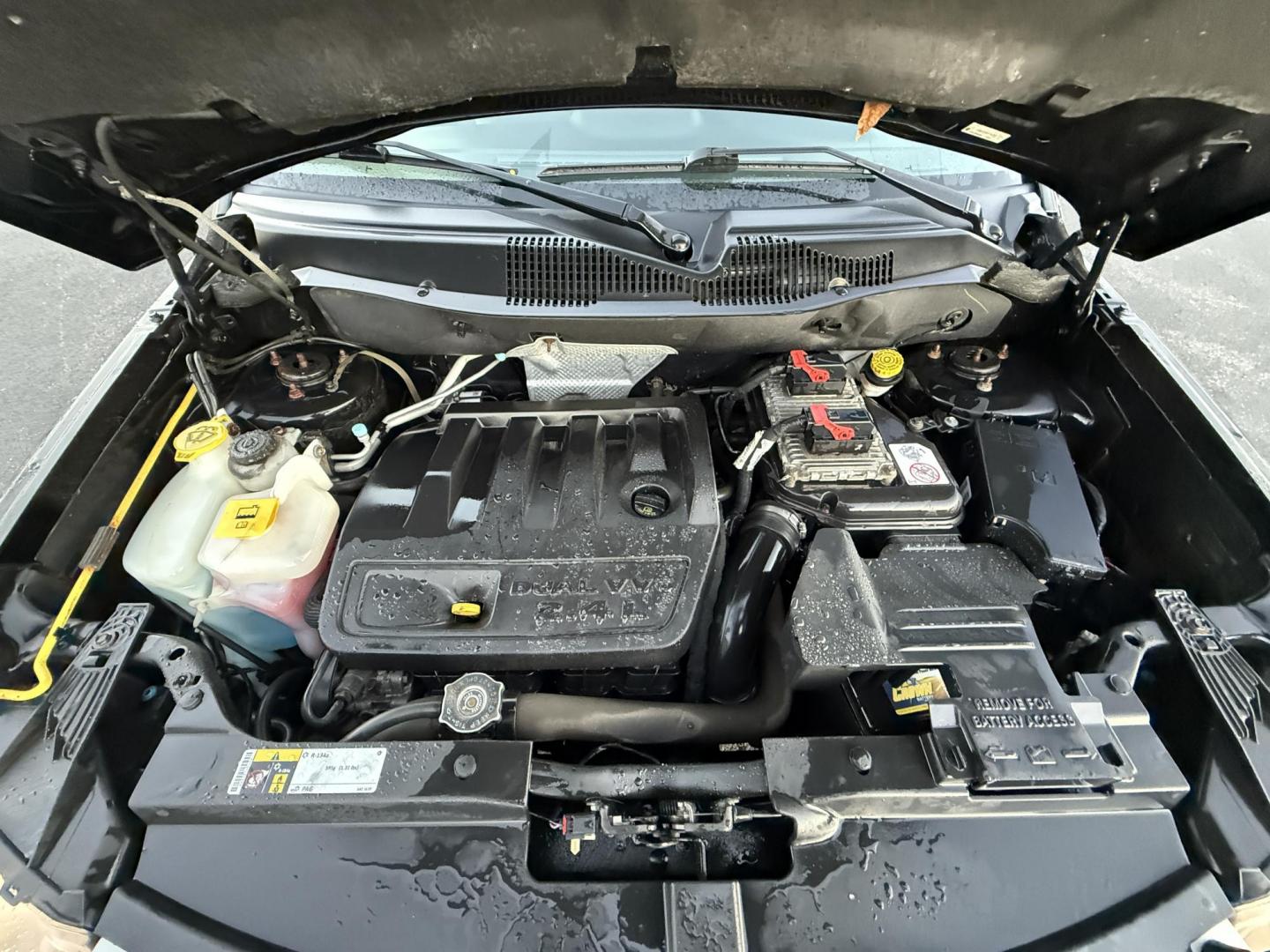 2015 Black /Black Jeep Compass Latitude 4WD (1C4NJDEB4FD) with an 2.4L I4 DOHC 16V engine, 6-Speed Automatic transmission, located at 11115 Chardon Rd. , Chardon, OH, 44024, (440) 214-9705, 41.580246, -81.241943 - Photo#14