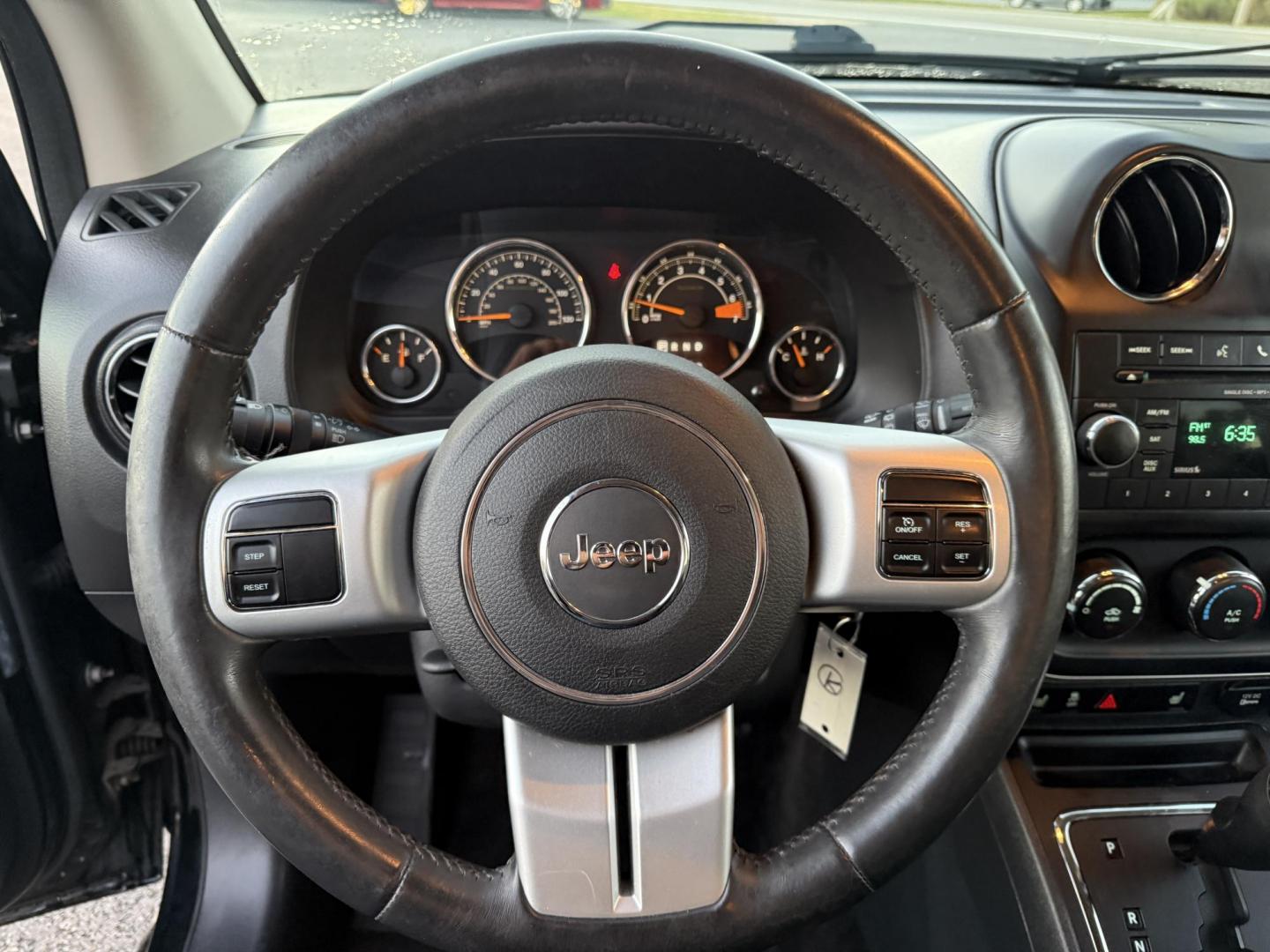 2015 Black /Black Jeep Compass Latitude 4WD (1C4NJDEB4FD) with an 2.4L I4 DOHC 16V engine, 6-Speed Automatic transmission, located at 11115 Chardon Rd. , Chardon, OH, 44024, (440) 214-9705, 41.580246, -81.241943 - Photo#23