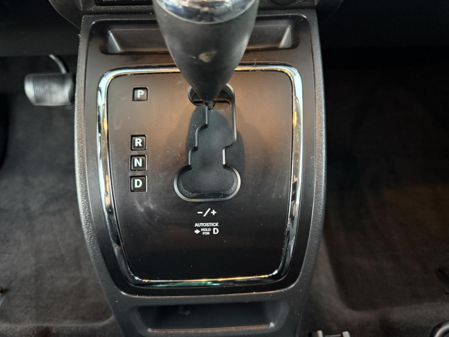 2015 Black /Black Jeep Compass Latitude 4WD (1C4NJDEB4FD) with an 2.4L I4 DOHC 16V engine, 6-Speed Automatic transmission, located at 11115 Chardon Rd. , Chardon, OH, 44024, (440) 214-9705, 41.580246, -81.241943 - Photo#26
