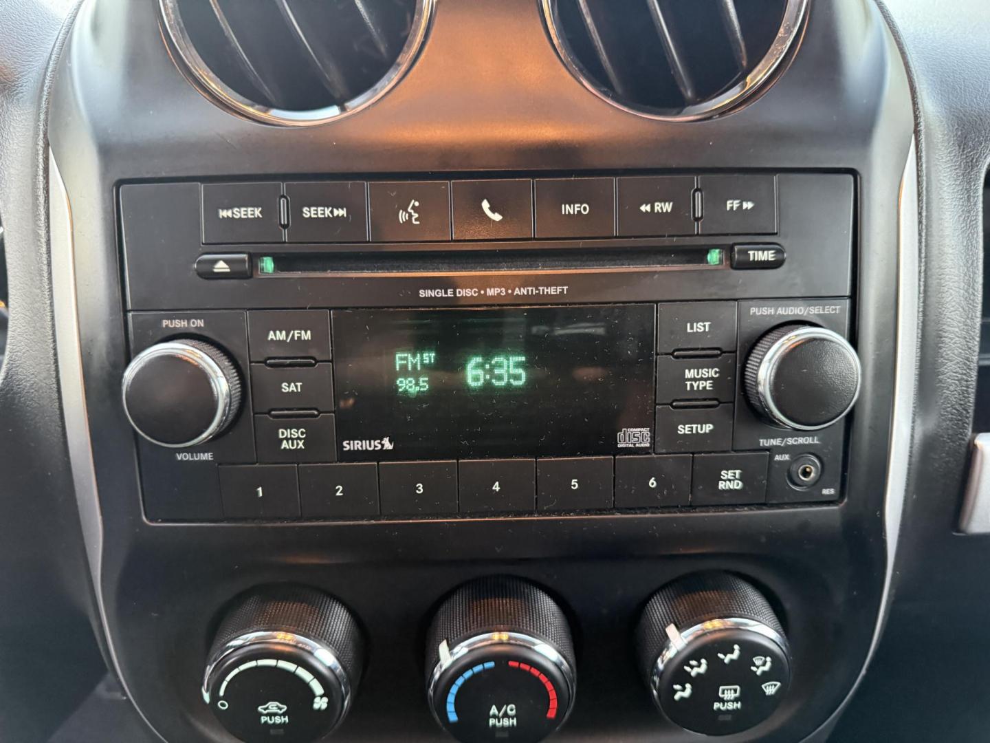 2015 Black /Black Jeep Compass Latitude 4WD (1C4NJDEB4FD) with an 2.4L I4 DOHC 16V engine, 6-Speed Automatic transmission, located at 11115 Chardon Rd. , Chardon, OH, 44024, (440) 214-9705, 41.580246, -81.241943 - Photo#24