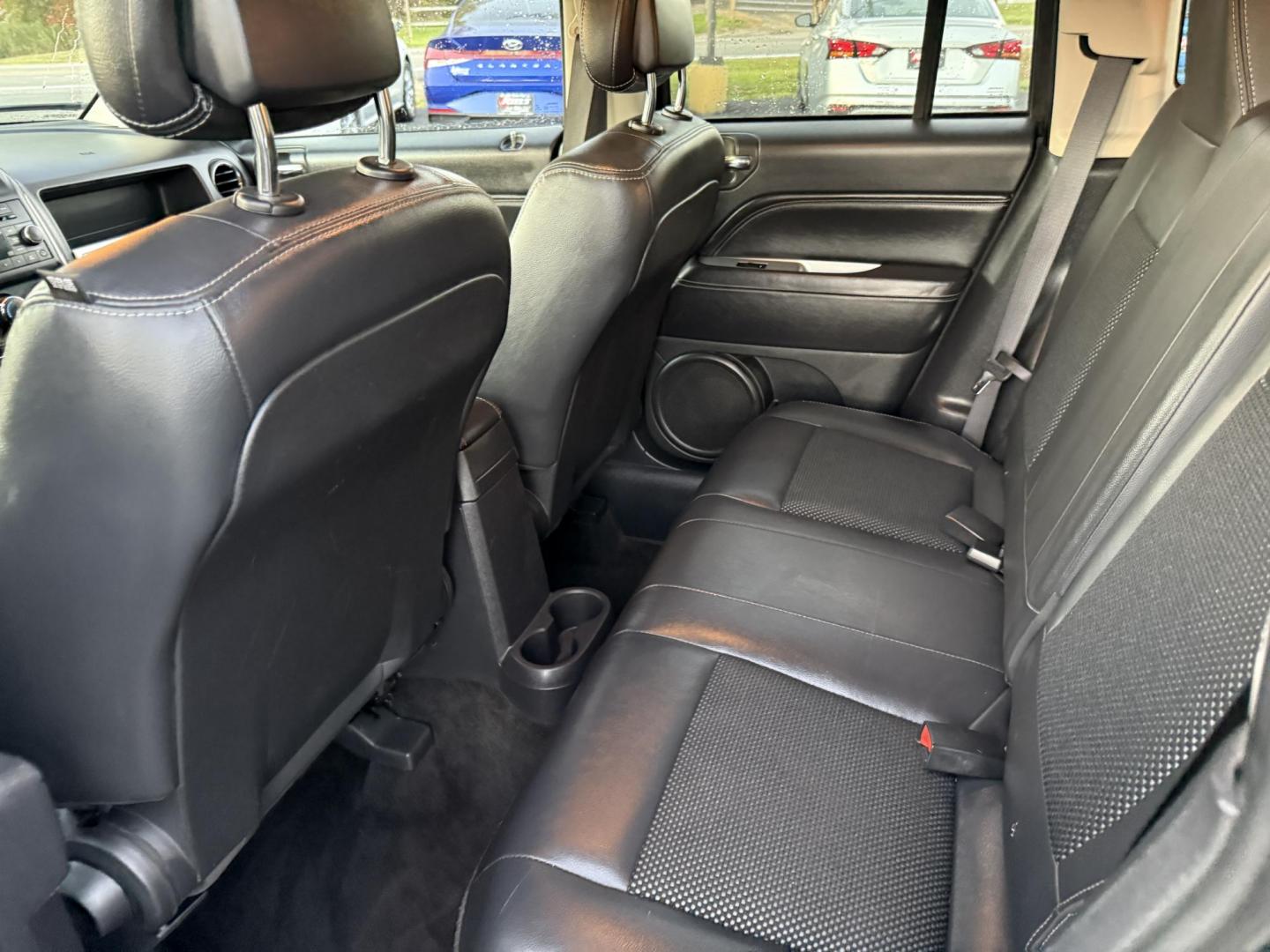 2015 Black /Black Jeep Compass Latitude 4WD (1C4NJDEB4FD) with an 2.4L I4 DOHC 16V engine, 6-Speed Automatic transmission, located at 11115 Chardon Rd. , Chardon, OH, 44024, (440) 214-9705, 41.580246, -81.241943 - Photo#29