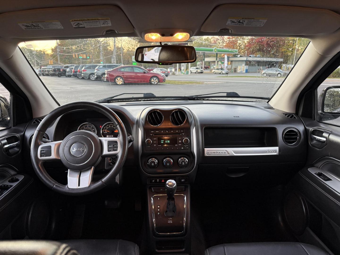 2015 Black /Black Jeep Compass Latitude 4WD (1C4NJDEB4FD) with an 2.4L I4 DOHC 16V engine, 6-Speed Automatic transmission, located at 11115 Chardon Rd. , Chardon, OH, 44024, (440) 214-9705, 41.580246, -81.241943 - Photo#32