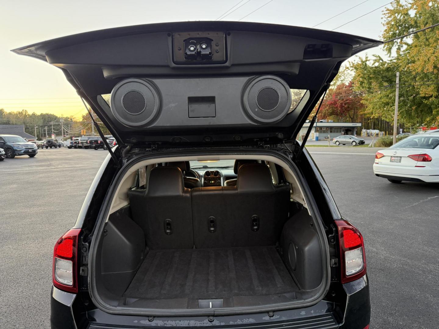 2015 Black /Black Jeep Compass Latitude 4WD (1C4NJDEB4FD) with an 2.4L I4 DOHC 16V engine, 6-Speed Automatic transmission, located at 11115 Chardon Rd. , Chardon, OH, 44024, (440) 214-9705, 41.580246, -81.241943 - Photo#35