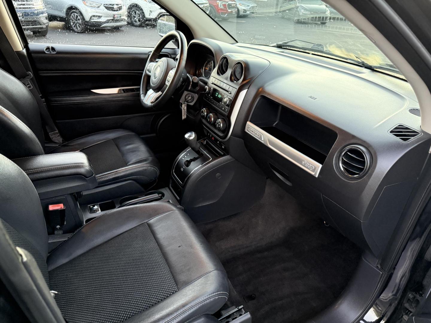 2015 Black /Black Jeep Compass Latitude 4WD (1C4NJDEB4FD) with an 2.4L I4 DOHC 16V engine, 6-Speed Automatic transmission, located at 11115 Chardon Rd. , Chardon, OH, 44024, (440) 214-9705, 41.580246, -81.241943 - Photo#38