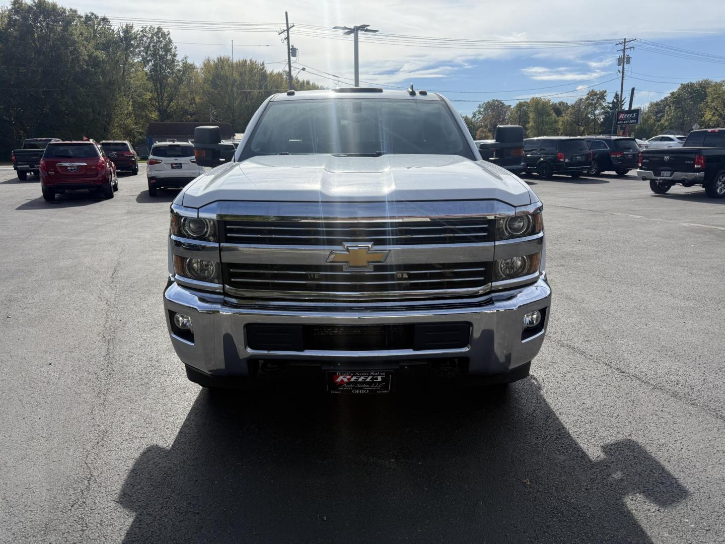 2017 White /Black Chevrolet Silverado 3500HD LT Double Cab Long Box 4WD (1GC2KZEG4HZ) with an 6.0L V8 OHV 16V FFV engine, 6A transmission, located at 547 E. Main St., Orwell, OH, 44076, (440) 437-5893, 41.535435, -80.847855 - Built to Haul, Loaded with Comfort – 2017 Silverado 3500 HD LT Double Cab Get the job done with confidence in this 2017 Chevrolet Silverado 3500 HD LT Double Cab Long Bed 4WD. Powered by a robust 6.0L Vortec V8 engine and a 6-speed automatic transmission with 4.10 gearing, this truck boasts a mas - Photo#1