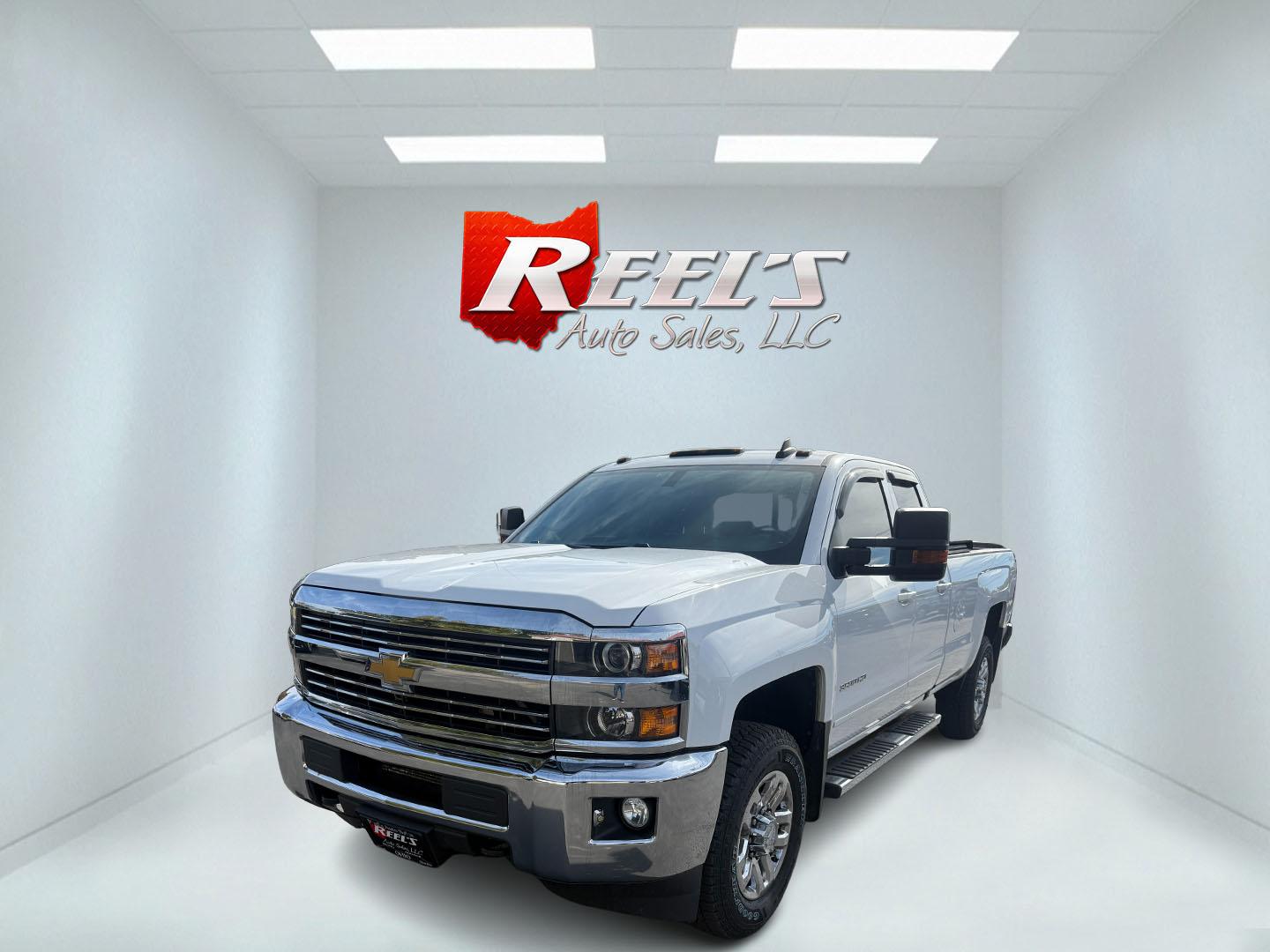 2017 White /Black Chevrolet Silverado 3500HD LT Double Cab Long Box 4WD (1GC2KZEG4HZ) with an 6.0L V8 OHV 16V FFV engine, 6A transmission, located at 547 E. Main St., Orwell, OH, 44076, (440) 437-5893, 41.535435, -80.847855 - Built to Haul, Loaded with Comfort – 2017 Silverado 3500 HD LT Double Cab Get the job done with confidence in this 2017 Chevrolet Silverado 3500 HD LT Double Cab Long Bed 4WD. Powered by a robust 6.0L Vortec V8 engine and a 6-speed automatic transmission with 4.10 gearing, this truck boasts a mas - Photo#0