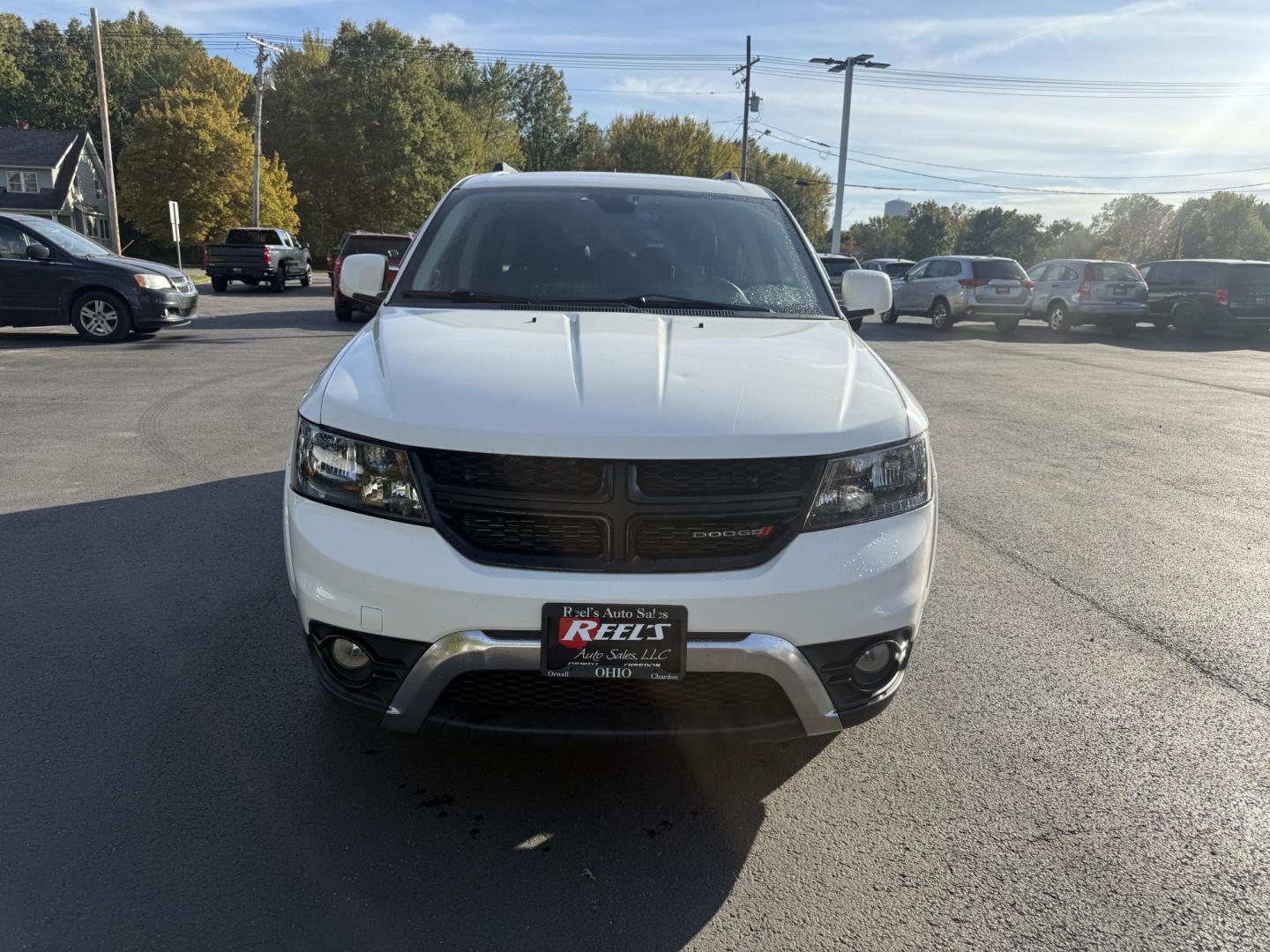 2018 White /Black Dodge Journey Crossroad AWD (3C4PDDGG1JT) with an 3.6L V6 DOHC 24V engine, 6A transmission, located at 547 E. Main St., Orwell, OH, 44076, (440) 437-5893, 41.535435, -80.847855 - Adventure-Ready and Family-Focused – 2018 Dodge Journey Crossroad AWD Embrace every journey with confidence in this 2018 Dodge Journey Crossroad AWD. Powered by the reliable 3.6L Pentastar V6 engine and a smooth 6-speed automatic transmission, this SUV delivers spirited performance while achiev - Photo#1