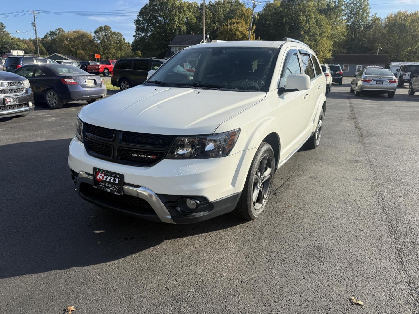 2018 White /Black Dodge Journey Crossroad AWD (3C4PDDGG1JT) with an 3.6L V6 DOHC 24V engine, 6A transmission, located at 547 E. Main St., Orwell, OH, 44076, (440) 437-5893, 41.535435, -80.847855 - Adventure-Ready and Family-Focused – 2018 Dodge Journey Crossroad AWD Embrace every journey with confidence in this 2018 Dodge Journey Crossroad AWD. Powered by the reliable 3.6L Pentastar V6 engine and a smooth 6-speed automatic transmission, this SUV delivers spirited performance while achiev - Photo#0
