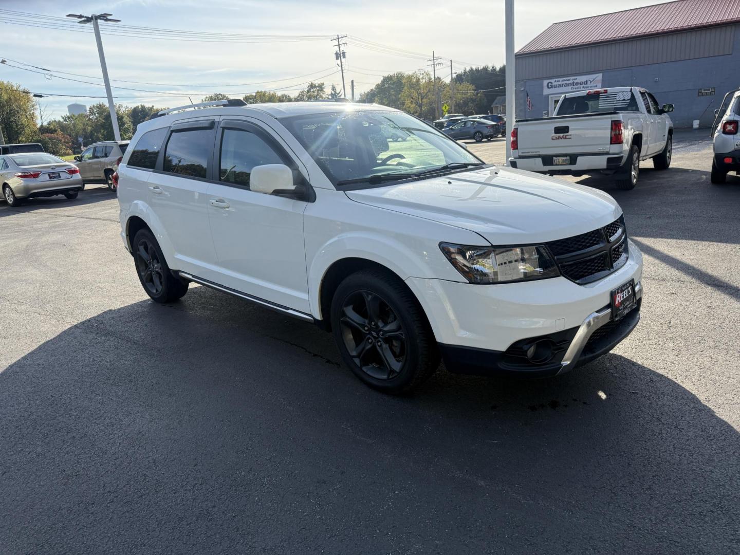 2018 White /Black Dodge Journey Crossroad AWD (3C4PDDGG1JT) with an 3.6L V6 DOHC 24V engine, 6A transmission, located at 547 E. Main St., Orwell, OH, 44076, (440) 437-5893, 41.535435, -80.847855 - Adventure-Ready and Family-Focused – 2018 Dodge Journey Crossroad AWD Embrace every journey with confidence in this 2018 Dodge Journey Crossroad AWD. Powered by the reliable 3.6L Pentastar V6 engine and a smooth 6-speed automatic transmission, this SUV delivers spirited performance while achiev - Photo#2