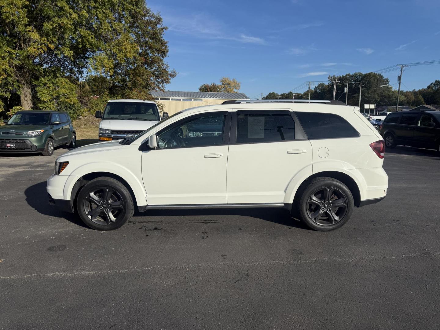 2018 White /Black Dodge Journey Crossroad AWD (3C4PDDGG1JT) with an 3.6L V6 DOHC 24V engine, 6A transmission, located at 547 E. Main St., Orwell, OH, 44076, (440) 437-5893, 41.535435, -80.847855 - Adventure-Ready and Family-Focused – 2018 Dodge Journey Crossroad AWD Embrace every journey with confidence in this 2018 Dodge Journey Crossroad AWD. Powered by the reliable 3.6L Pentastar V6 engine and a smooth 6-speed automatic transmission, this SUV delivers spirited performance while achiev - Photo#12