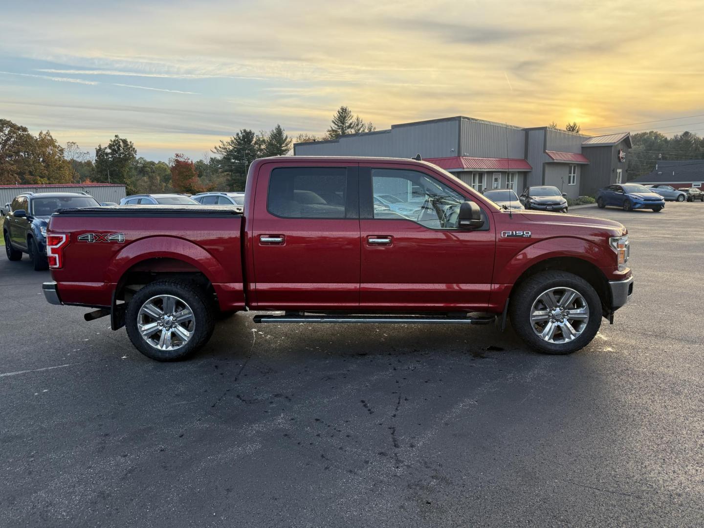 2019 Red /Gray Ford F-150 XLT SuperCrew 5.5-ft. Bed 4WD (1FTEW1E43KF) with an 3.5L V6 Twin Turbo engine, 10 Speed Automatic Transmission transmission, located at 11115 Chardon Rd. , Chardon, OH, 44024, (440) 214-9705, 41.580246, -81.241943 - Photo#4