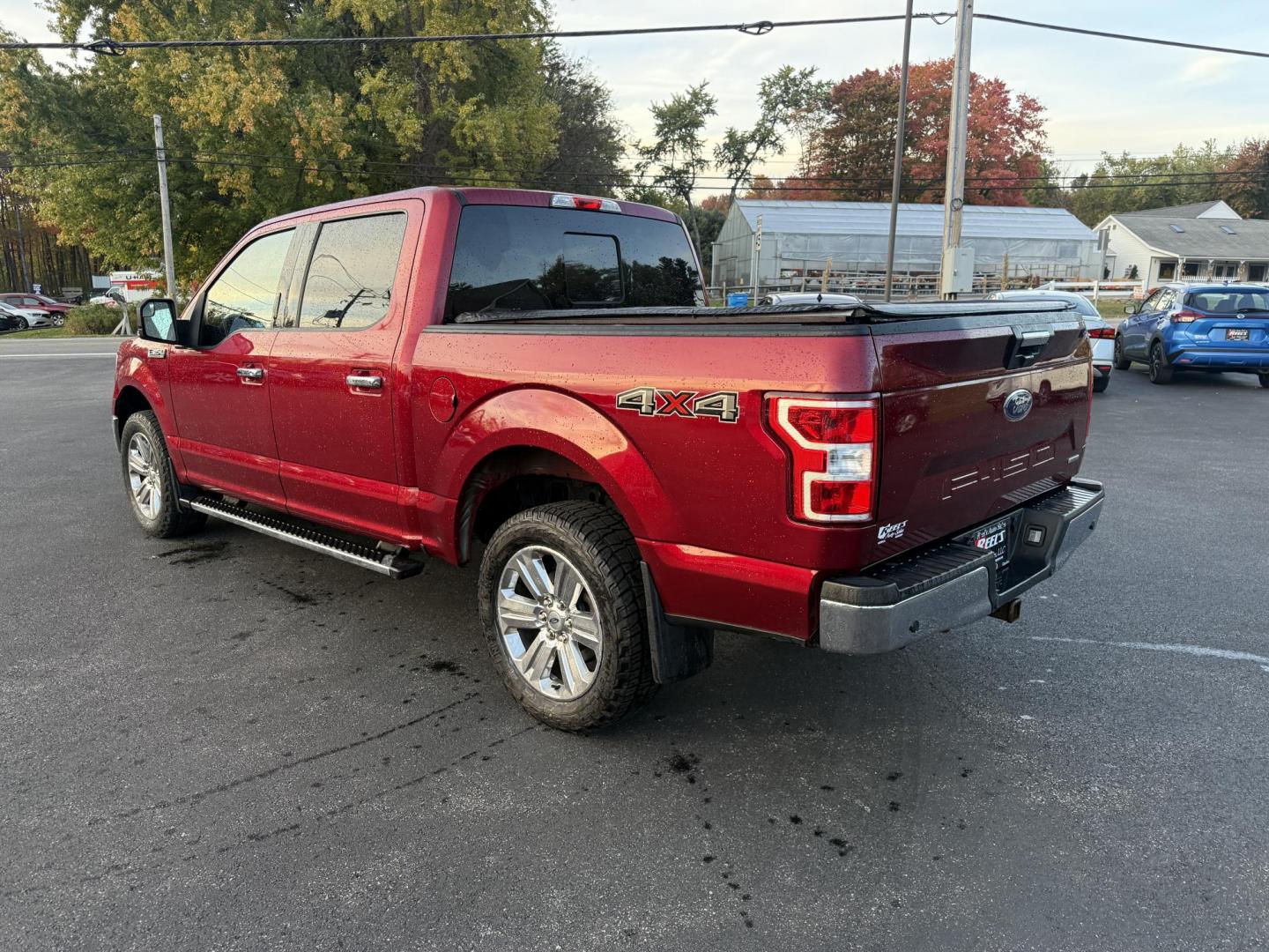 2019 Red /Gray Ford F-150 XLT SuperCrew 5.5-ft. Bed 4WD (1FTEW1E43KF) with an 3.5L V6 Twin Turbo engine, 10 Speed Automatic Transmission transmission, located at 11115 Chardon Rd. , Chardon, OH, 44024, (440) 214-9705, 41.580246, -81.241943 - Photo#11