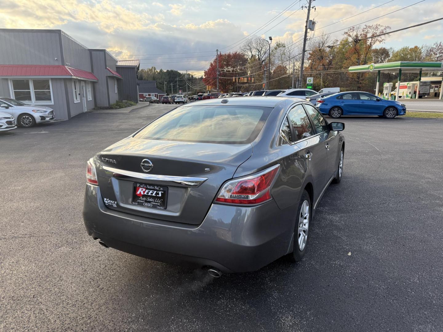 2015 Silver /Black Nissan Altima 2.5 S (1N4AL3AP1FC) with an 2.5L I4 DOHC 16V engine, Automatic transmission, located at 11115 Chardon Rd. , Chardon, OH, 44024, (440) 214-9705, 41.580246, -81.241943 - 2015 Nissan Altima 2.5 S – Low Mileage, Impressive Efficiency, and Everyday Comfort Enjoy outstanding reliability and remarkable efficiency with this 2015 Nissan Altima 2.5 S, boasting only 22,008 miles! Its fuel-sipping 2.5L I4 engine returns up to 37 MPG on the highway, making it the perfect - Photo#7