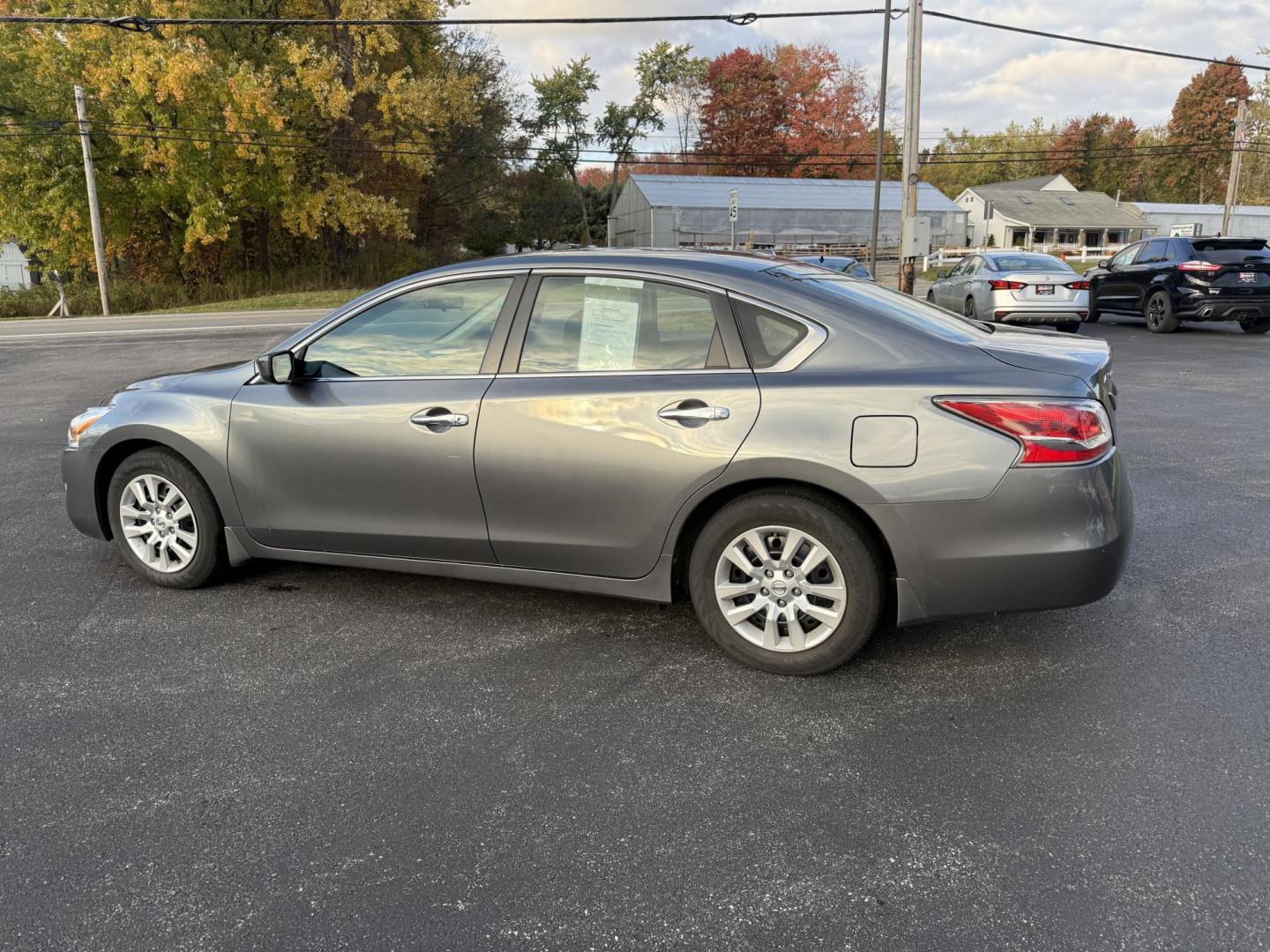 2015 Silver /Black Nissan Altima 2.5 S (1N4AL3AP1FC) with an 2.5L I4 DOHC 16V engine, Automatic transmission, located at 11115 Chardon Rd. , Chardon, OH, 44024, (440) 214-9705, 41.580246, -81.241943 - 2015 Nissan Altima 2.5 S – Low Mileage, Impressive Efficiency, and Everyday Comfort Enjoy outstanding reliability and remarkable efficiency with this 2015 Nissan Altima 2.5 S, boasting only 22,008 miles! Its fuel-sipping 2.5L I4 engine returns up to 37 MPG on the highway, making it the perfect - Photo#10